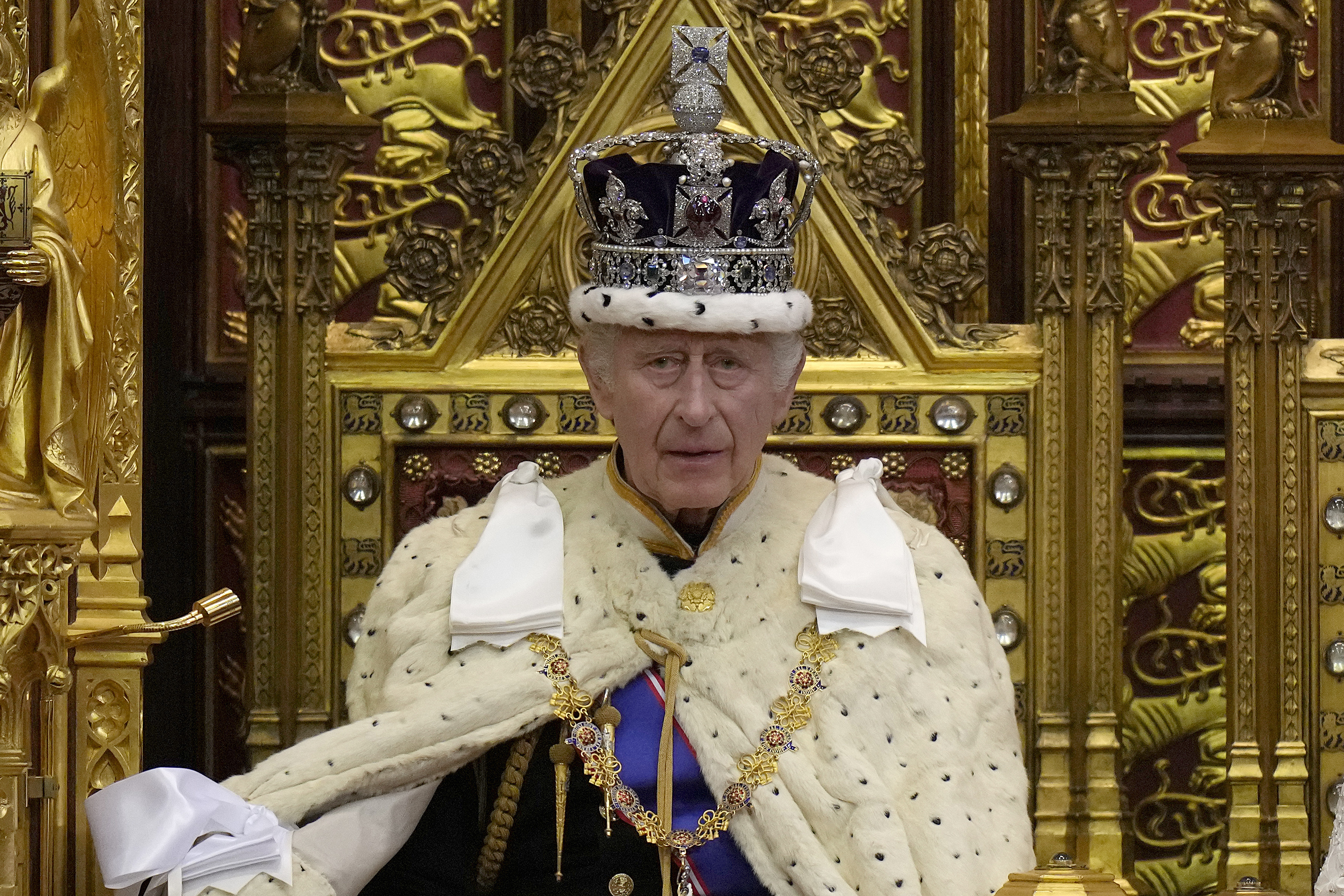 FILE - Britain's King Charles III pauses during the State Opening of Parliament at the Palace of Westminster in London on Nov. 7, 2023. (AP Photo/Alastair Grant, Pool, File)