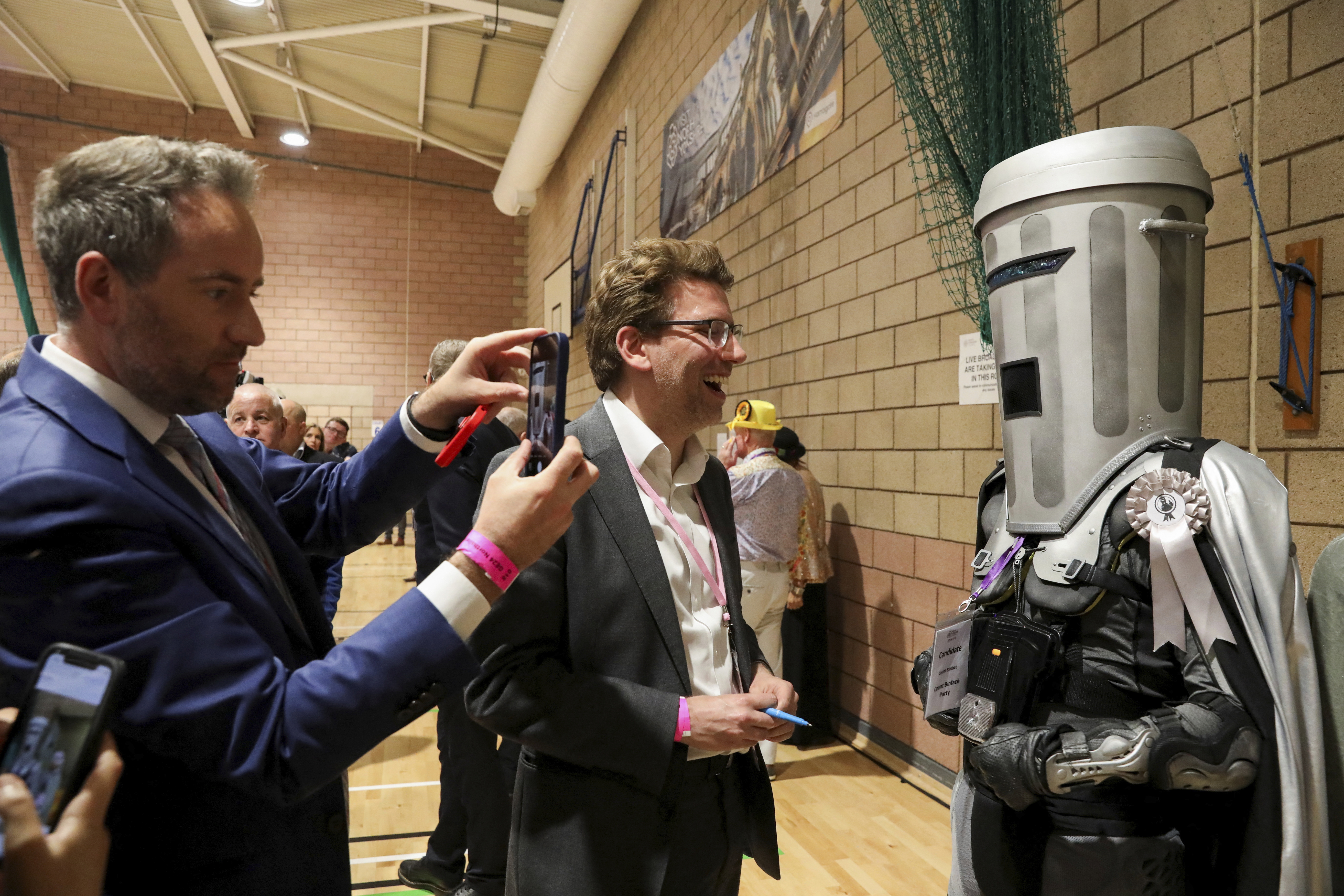 Independent candidate Count Binface speaks to a journalist as he arrives for the vote count in Britain's general election at the Richmond and Northallerton count center in Northallerton, England, Friday July 5, 2024. (Temilade Adelaja, Pool via AP)