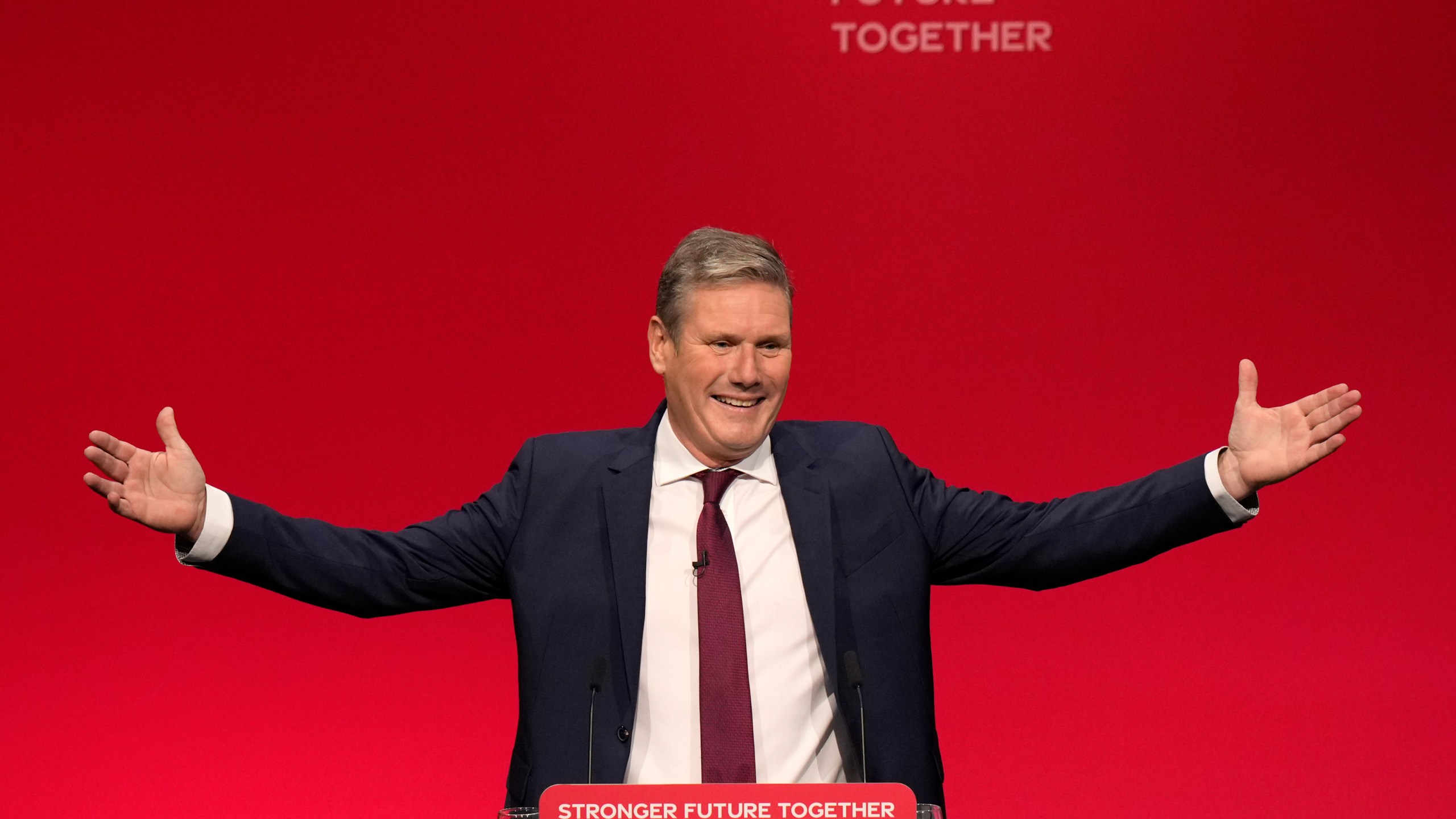 FILE - Leader of the British Labour Party Keir Starmer gestures as he arrives to make his keynote speech at the annual party conference in Brighton, England, Wednesday, Sept. 29, 2021. (AP Photo/Alastair Grant, File)