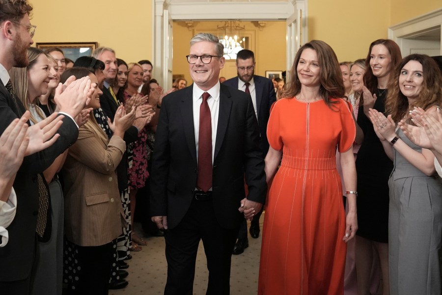 FILE - Britain's newly elected Prime Minister Keir Starmer and his wife Victoria enter his official London residence at No 10 Downing Street for the first time after the Labour Party won a landslide victory in the 2024 general election, in London, Friday July 5, 2024. After a few hours of sleep to shake off a night of celebration and an audience with the king, Keir Starmer will step through the front door of 10 Downing St. for the first time as prime minister on Friday. (Stefan Rousseau/Pool Photo via AP, File)