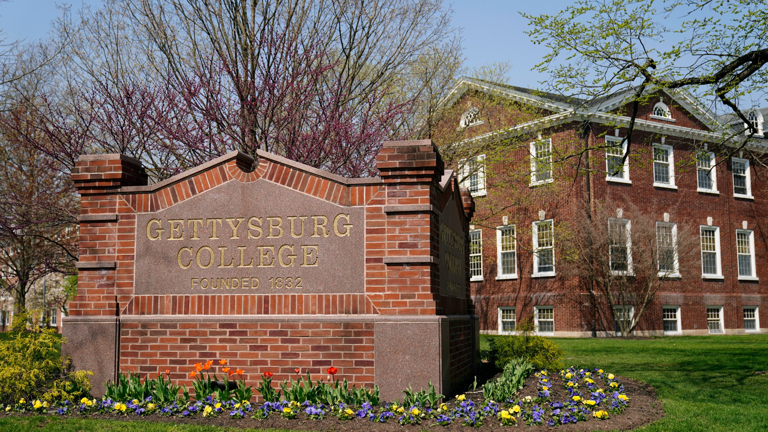 FILE - In this April 7, 2021, file photo shown is the Gettysburg College campus in Gettysburg, Pa. Authorities in Pennsylvania on Tuesday, June 29, 2021, filed an arrest warrant in a 2013 campus attack at Gettysburg University, nearly eight years after the victim went to police and a year after she received an online message that said, "So I raped you." (AP Photo/Matt Rourke, File)