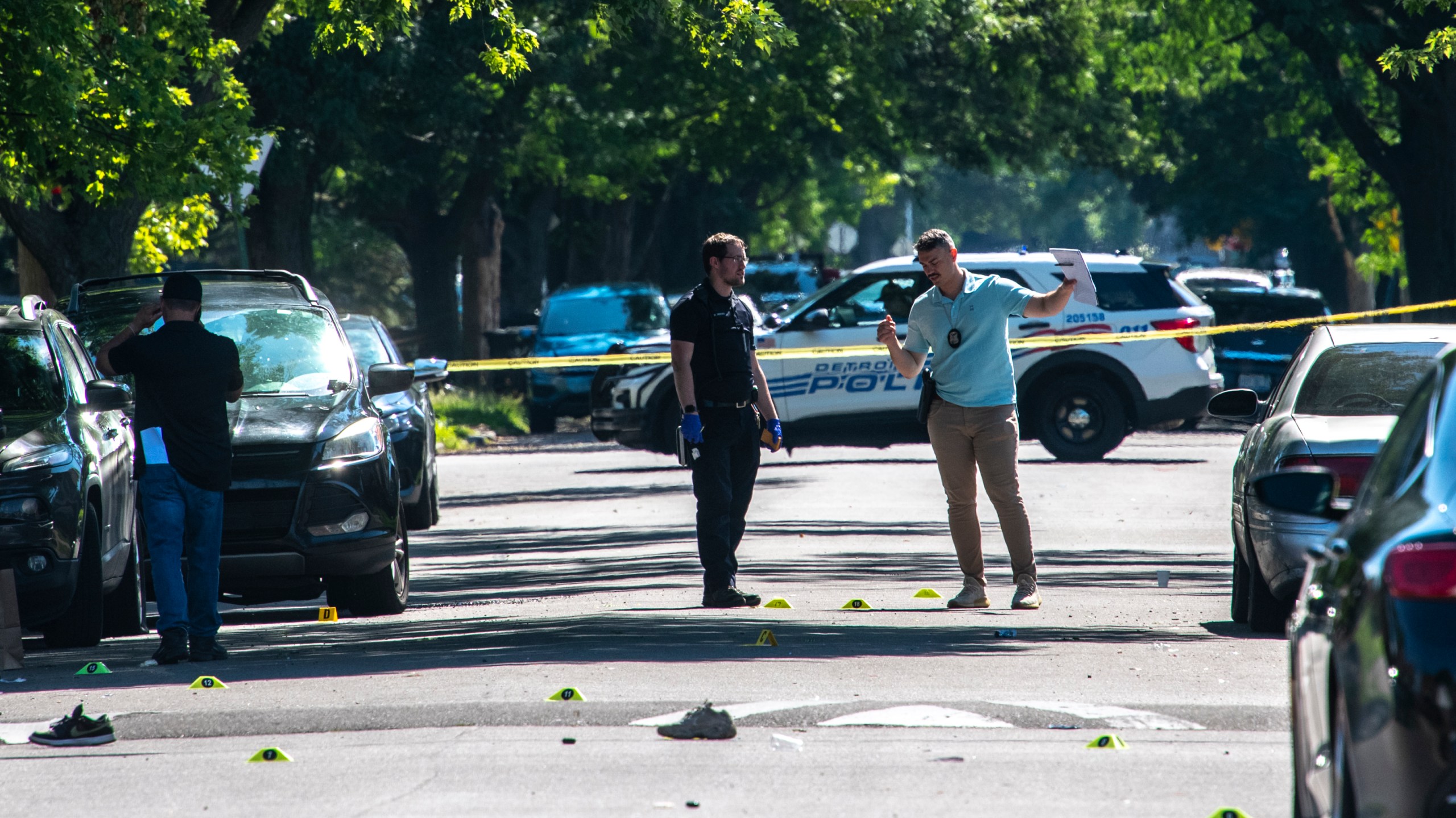 Detroit police investigate the scene of a shooting that happened early Sunday, July 7, 2024, in Detroit. (John T. Greilick/Detroit News via AP)