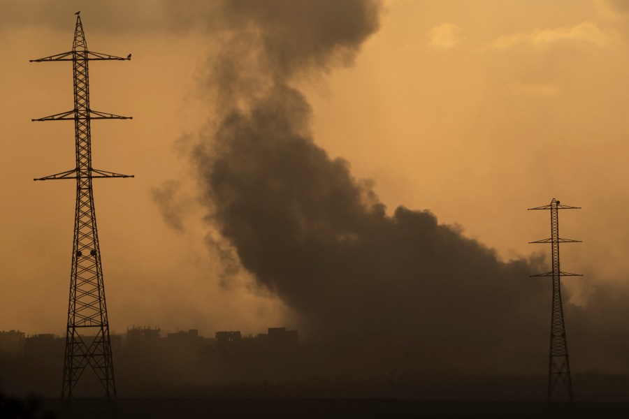 Smoke rises to the sky after an explosion in the Gaza Strip as seen from southern Israel, Monday, July 8, 2024. Israeli forces advanced deeper into the Gaza Strip's largest city in pursuit of militants who had regrouped there, sending thousands of Palestinians fleeing on Monday from an area ravaged in the early weeks of the nine-month-long war. (AP Photo/Leo Correa)