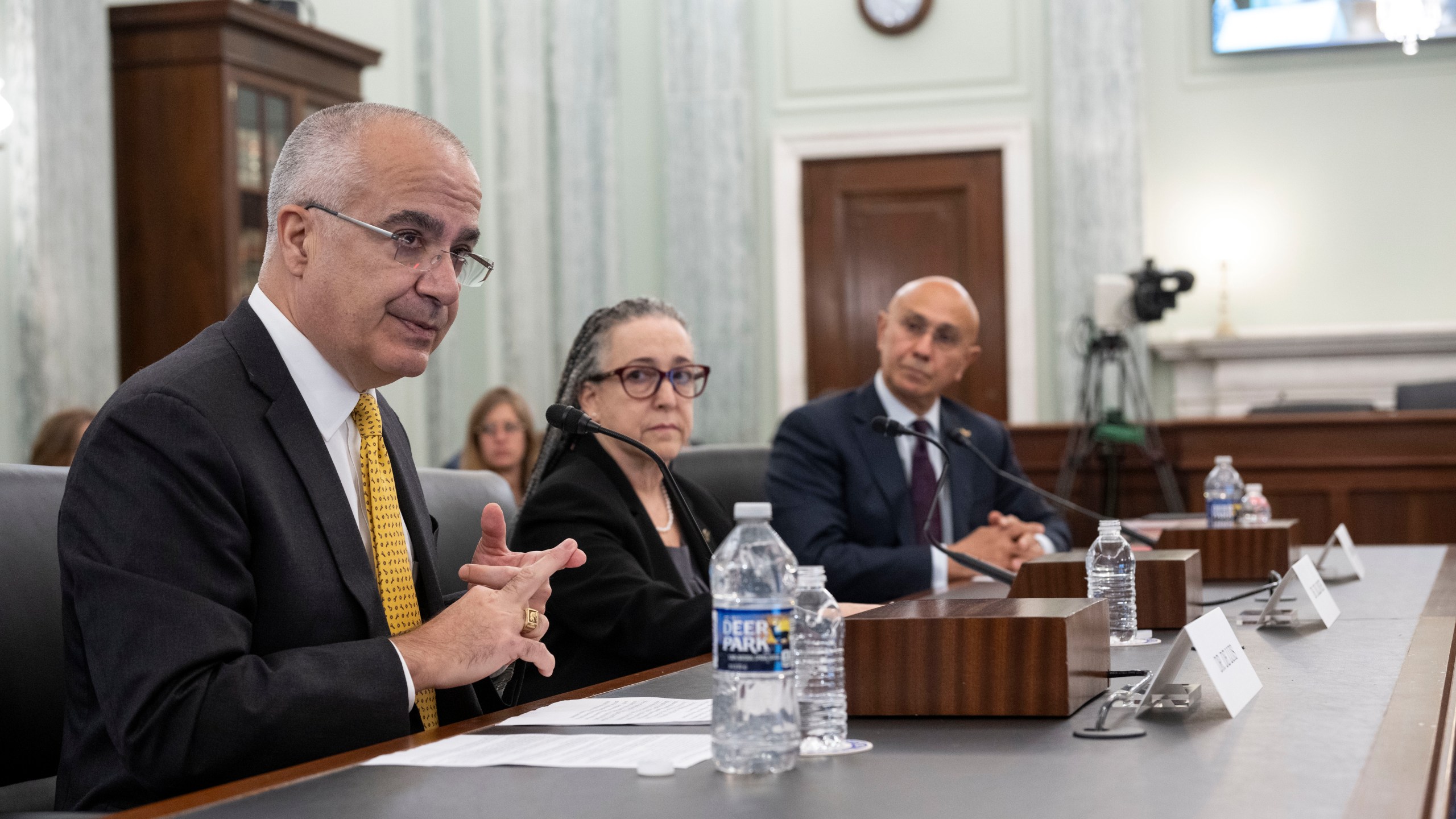 FILE - Dr. Javier de Luis, left, whose sister died in a Boeing Max crash, testifies before the Senate Commerce, Science, and Transportation hearings with Dr. Tracy Dillinger, center and Dr. Najmedin Meshkation on Capitol Hill, April 17, 2024, in Washington. (AP Photo/Kevin Wolf, File)