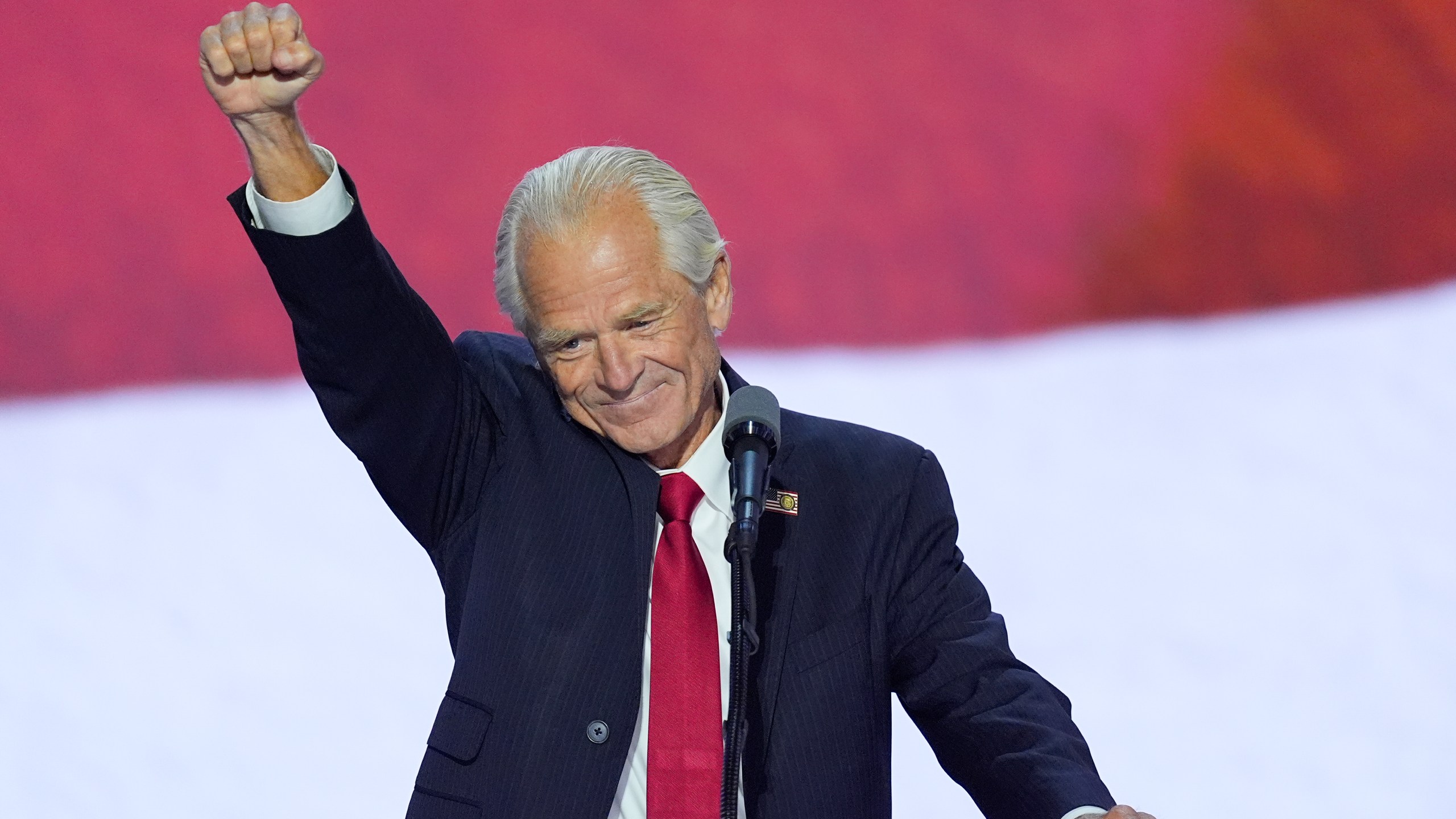 Peter Navarro raises his fist while speaking during the Republican National Convention on Wednesday, July 17, 2024, in Milwaukee. (AP Photo/J. Scott Applewhite)