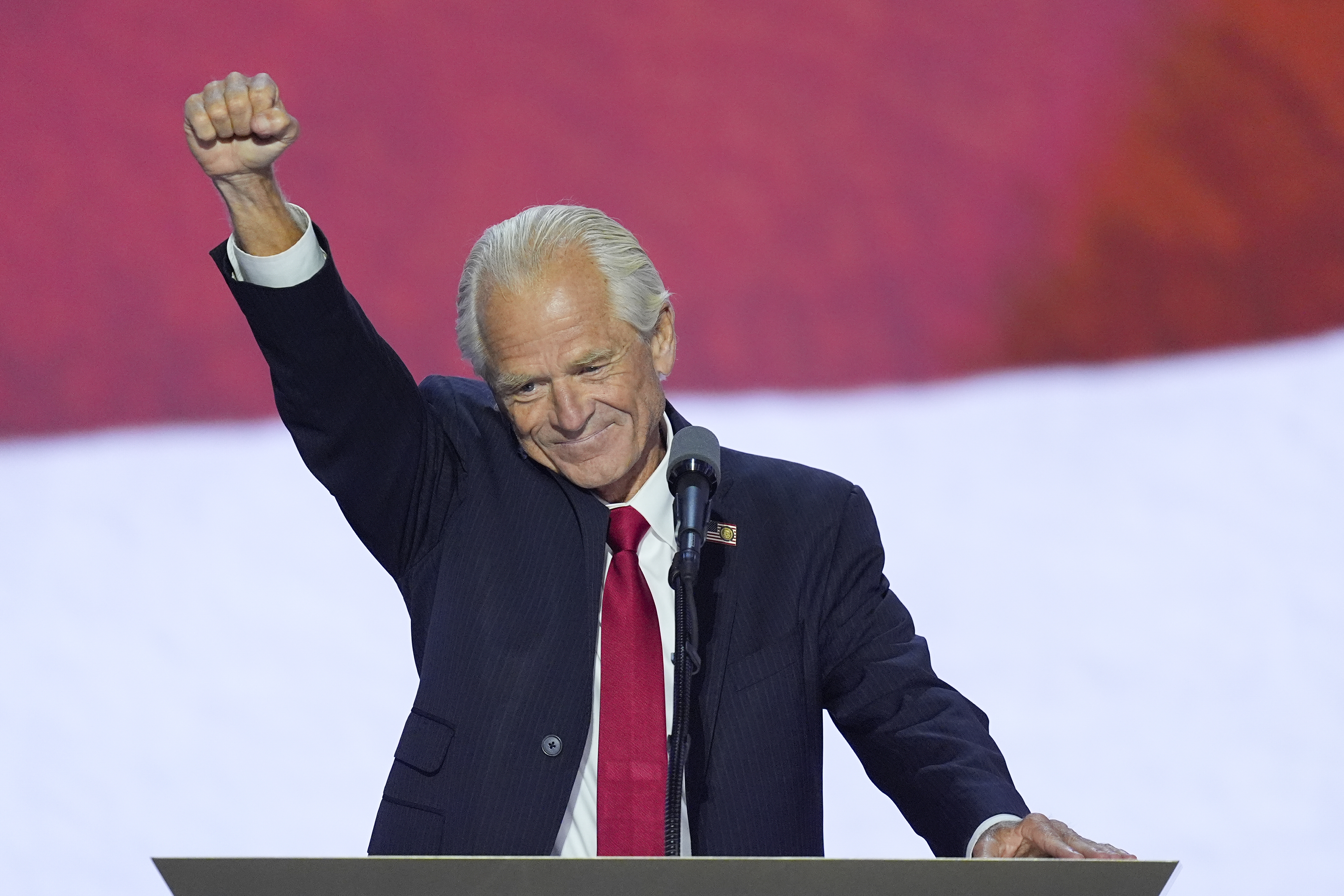 Peter Navarro raises his fist while speaking during the Republican National Convention on Wednesday, July 17, 2024, in Milwaukee. (AP Photo/J. Scott Applewhite)
