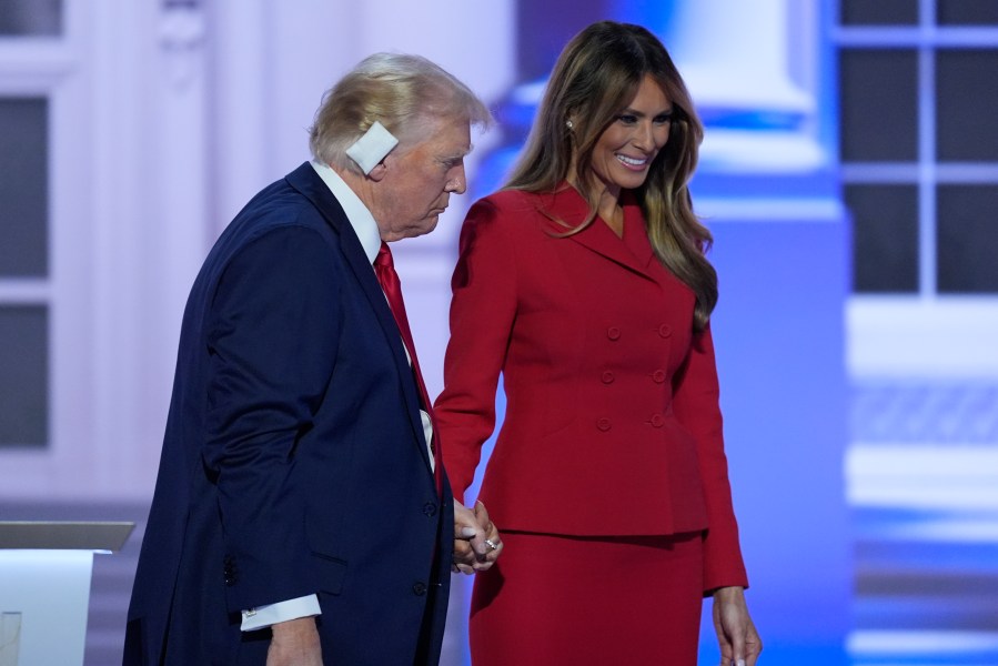 Republican presidential candidate former President Donald Trump is joined on stage by former first lady Melania Trump at the Republican National Convention Thursday, July 18, 2024, in Milwaukee. (AP Photo/J. Scott Applewhite)