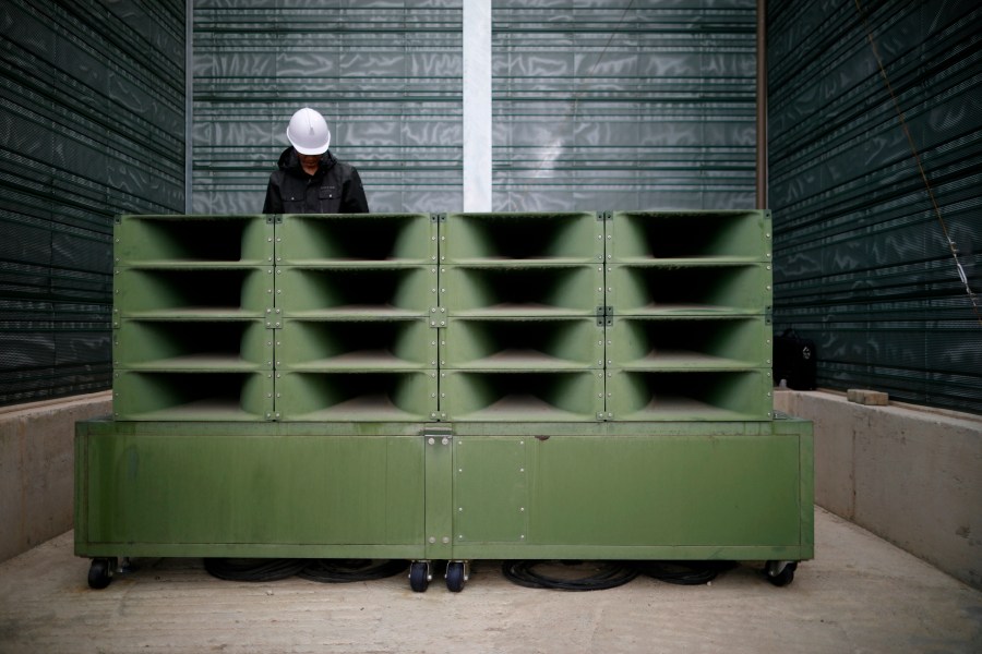 FILE - A worker dismantles loudspeakers that set up for propaganda broadcasts near the demilitarized zone separating the two Koreas in Paju, South Korea, on May 1, 2018. South Korea said Friday, July 19, 2024, it has restarted anti-Pyongyang propaganda broadcasts across the border in response to North Korea’s resumption of trash-carrying balloon launches. (Kim Hong-Ji/Pool Photo via AP, File)