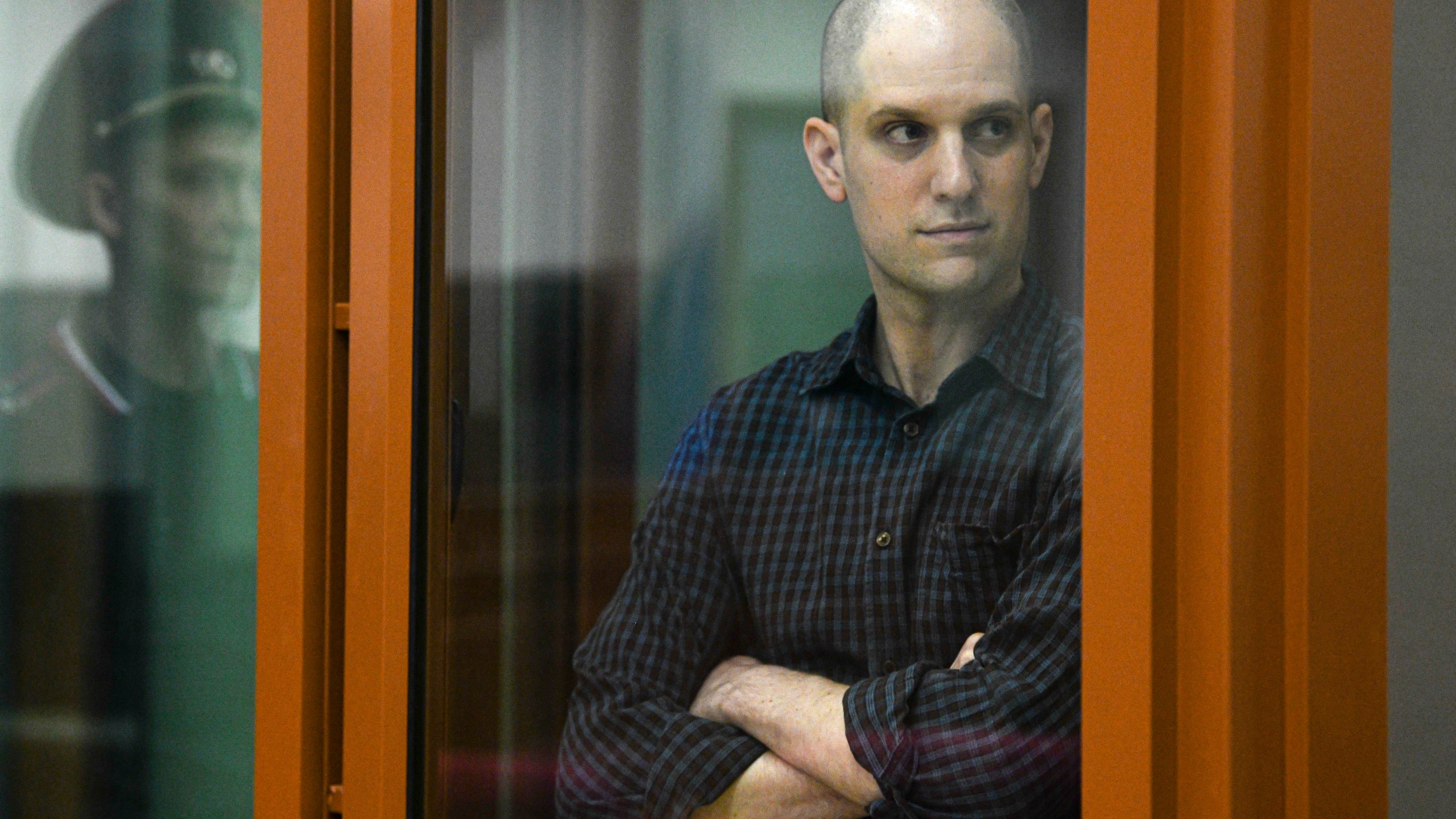 FILE - Wall Street Journal reporter Evan Gershkovich stands in a glass cage in a courtroom in Yekaterinburg, Russia, Wednesday, June 26, 2024. Court officials say closing arguments in the espionage trial of U.S. journalist Evan Gershkovich will be held Friday, July 19, 2024, as the proceedings picked up speed in a case that has seen the reporter held in pre-trial custody for over a year. (AP Photo, File)