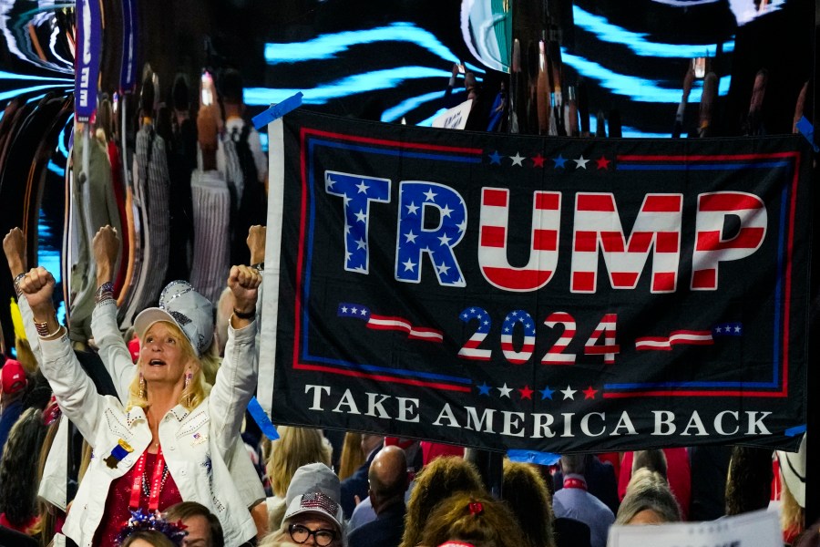 A supporter cheers during the Republican National Convention Thursday, July 18, 2024, in Milwaukee. (AP Photo/Charles Rex Arbogast)