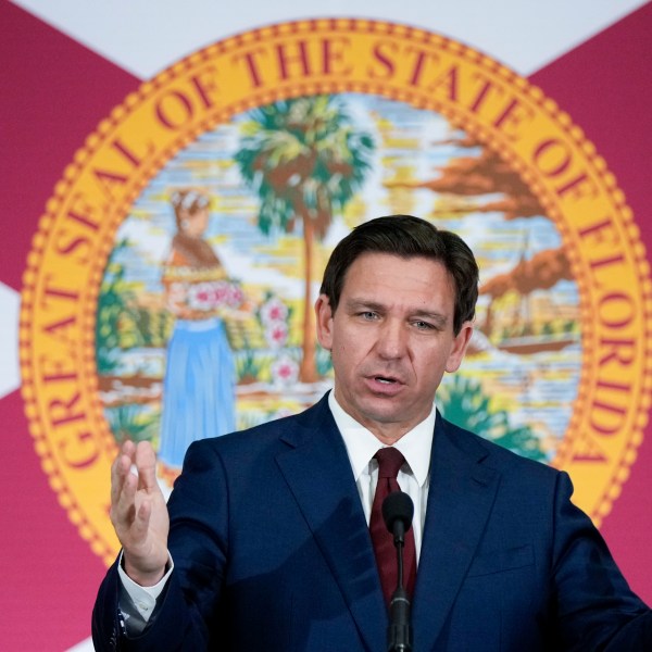 FILE - Florida Gov. Ron DeSantis speaks during a news conference in Miami, on May 9, 2023. The Treasury Department is warning that state laws that restrict banks from considering environmental, social and governance factors could harm efforts to address money laundering and terrorism financing. The Associated Press obtained a copy of a letter sent Thursday to lawmakers. The letter single out a law signed by Florida Gov. Ron DeSantis in May that says it would be an “unsafe and unsound practice” for banks to consider non-financial factors when doing business. (AP Photo/Rebecca Blackwell, File)