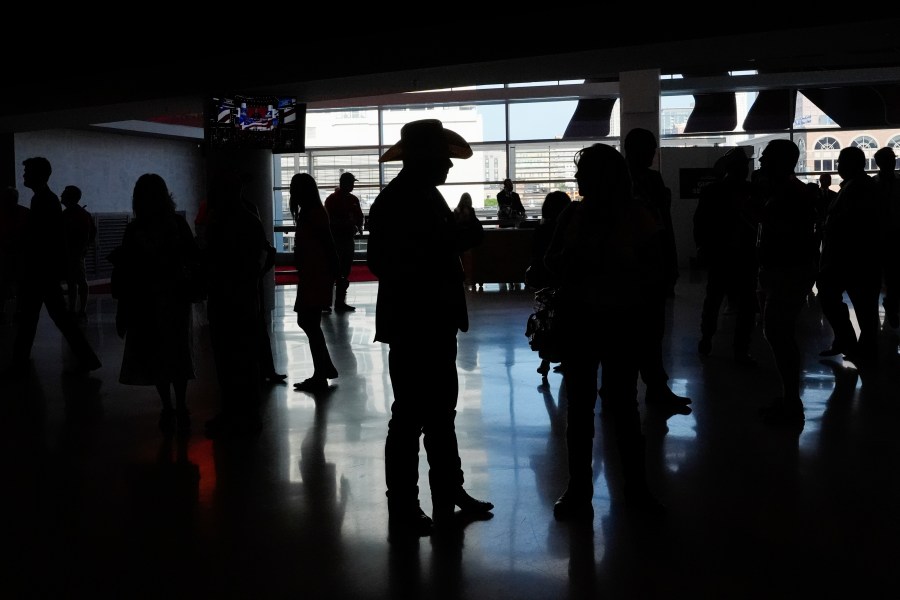 Delegates arrive at the Republican National Convention Tuesday, July 16, 2024, in Milwaukee. (AP Photo/Nam Y. Huh)