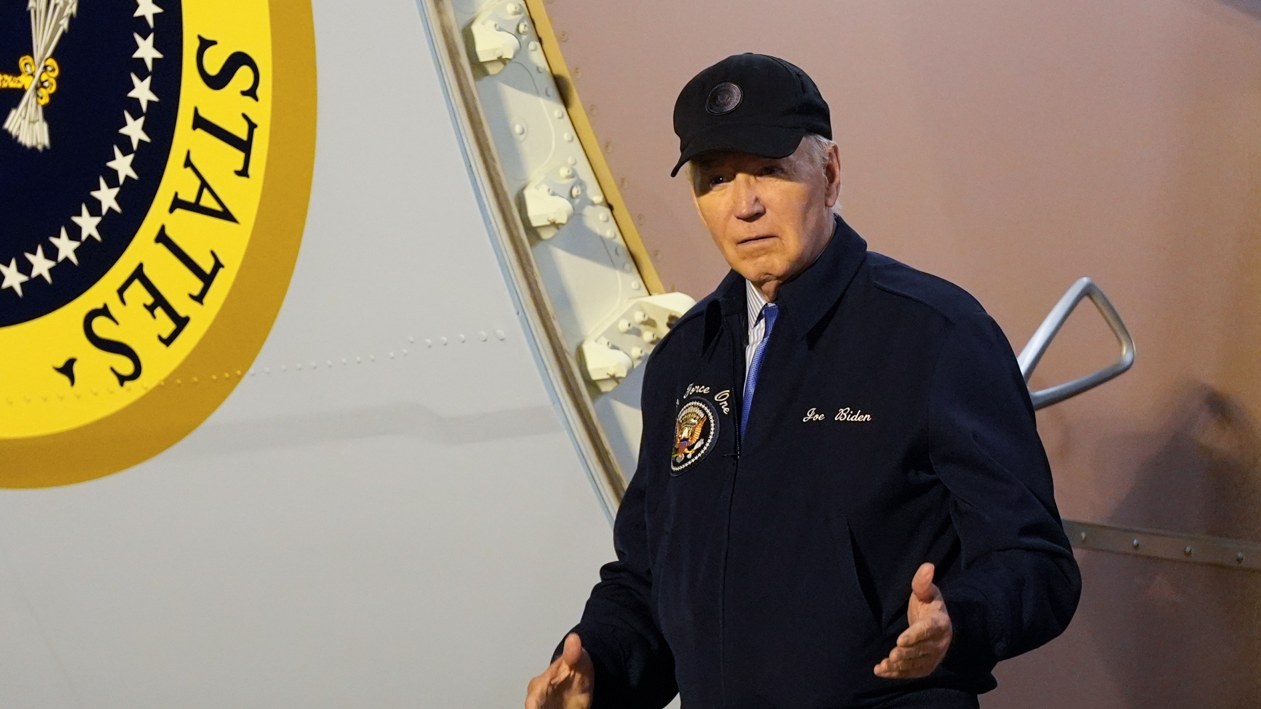 President Joe Biden walks down the steps of Air Force One at Dover Air Force Base in Delaware, Wednesday, July 17, 2024. Biden is returning to his home in Rehoboth Beach, Del., to self-isolate after testing positive for COVID-19. (AP Photo/Susan Walsh)