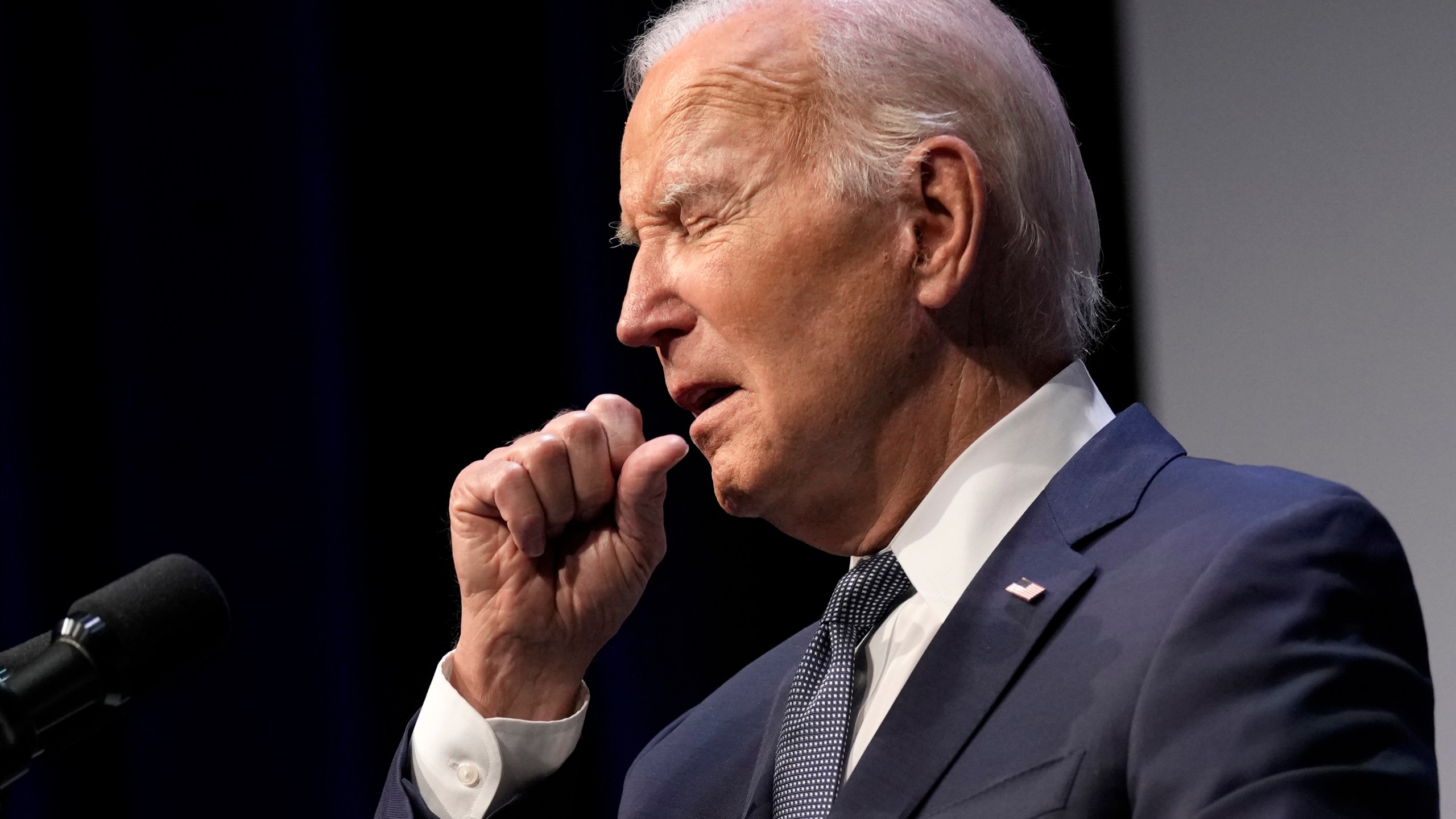 President Joe Biden coughs during an event with Rep. Steven Horsford, D-Nev., in Las Vegas, Tuesday, July 16, 2024. Biden tested positive for COVID-19. (AP Photo/Susan Walsh)