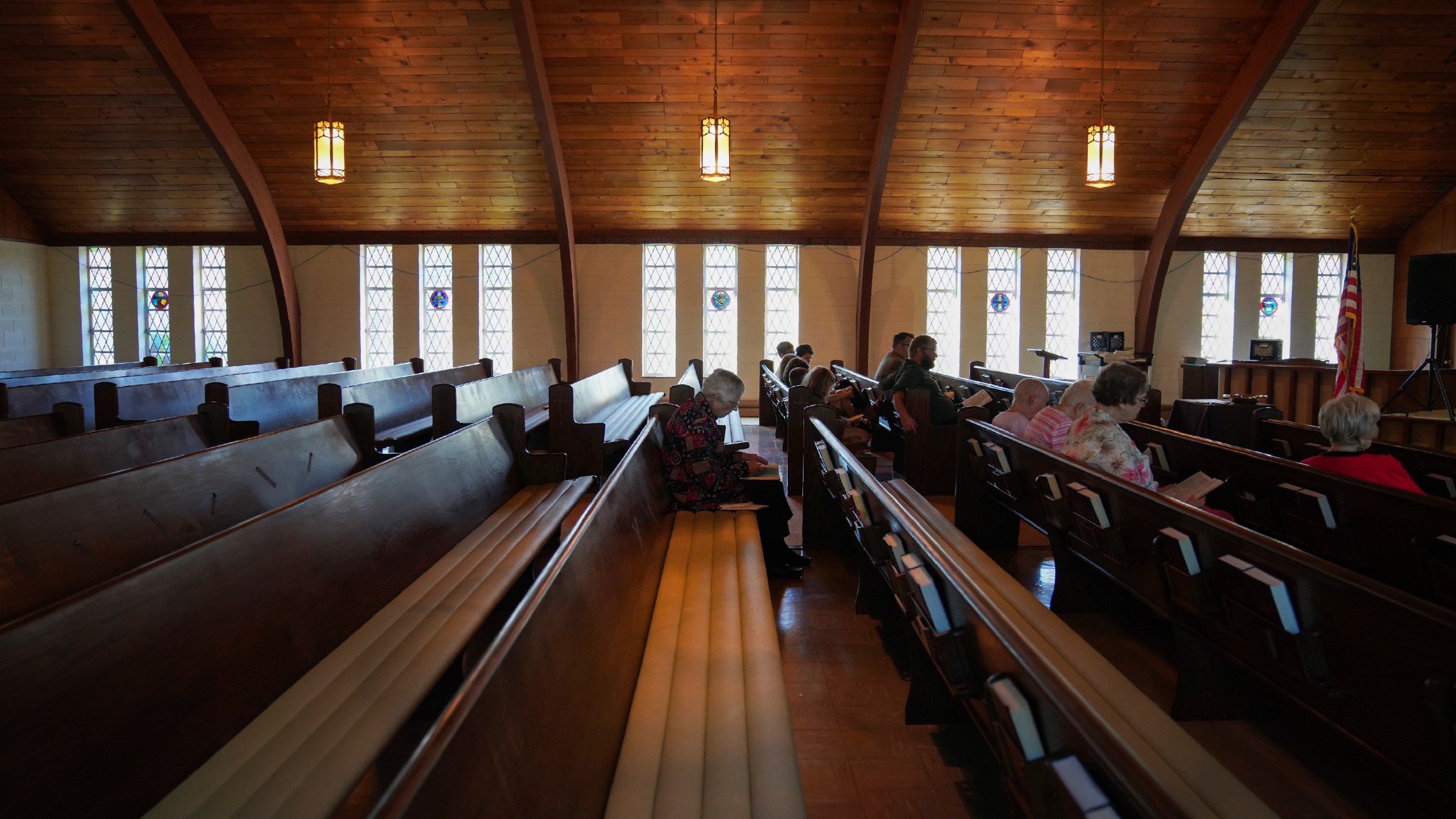 FILE - Roughly a dozen people attend pastor Ryan Burge's Sunday service at First Baptist Church in Mt. Vernon, Ill., Sept. 10, 2023. (AP Photo/Jessie Wardarski, File)