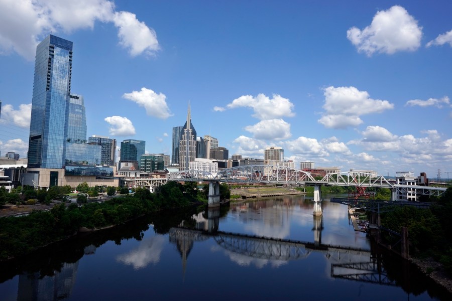 FILE - The Nashville, Tenn., skyline is reflected in the Cumberland River July 11, 2022. A panel of judges has struck down a 2023 change approved by Tennessee Republican lawmakers that would cut the size of Democratic-leaning Nashville’s Metro Council in half. The decision Monday, July 29, 2024, marks another court defeat for a series of state laws passed last year to cut into Nashville’s autonomy, extending to its international airport and pro sports facilities. (AP Photo/Mark Humphrey, File)