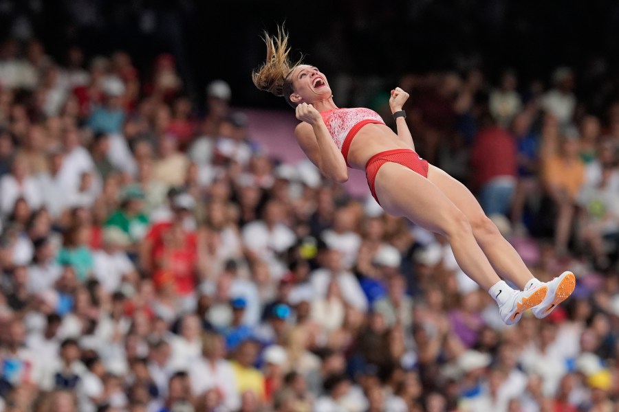 FILE - Alysha Newman, of Canada, celebrates a successful vault as she competes in the women's pole vault final at the 2024 Summer Olympics, Wednesday, Aug. 7, 2024, in Saint-Denis, France. (AP Photo/Rebecca Blackwell, File)