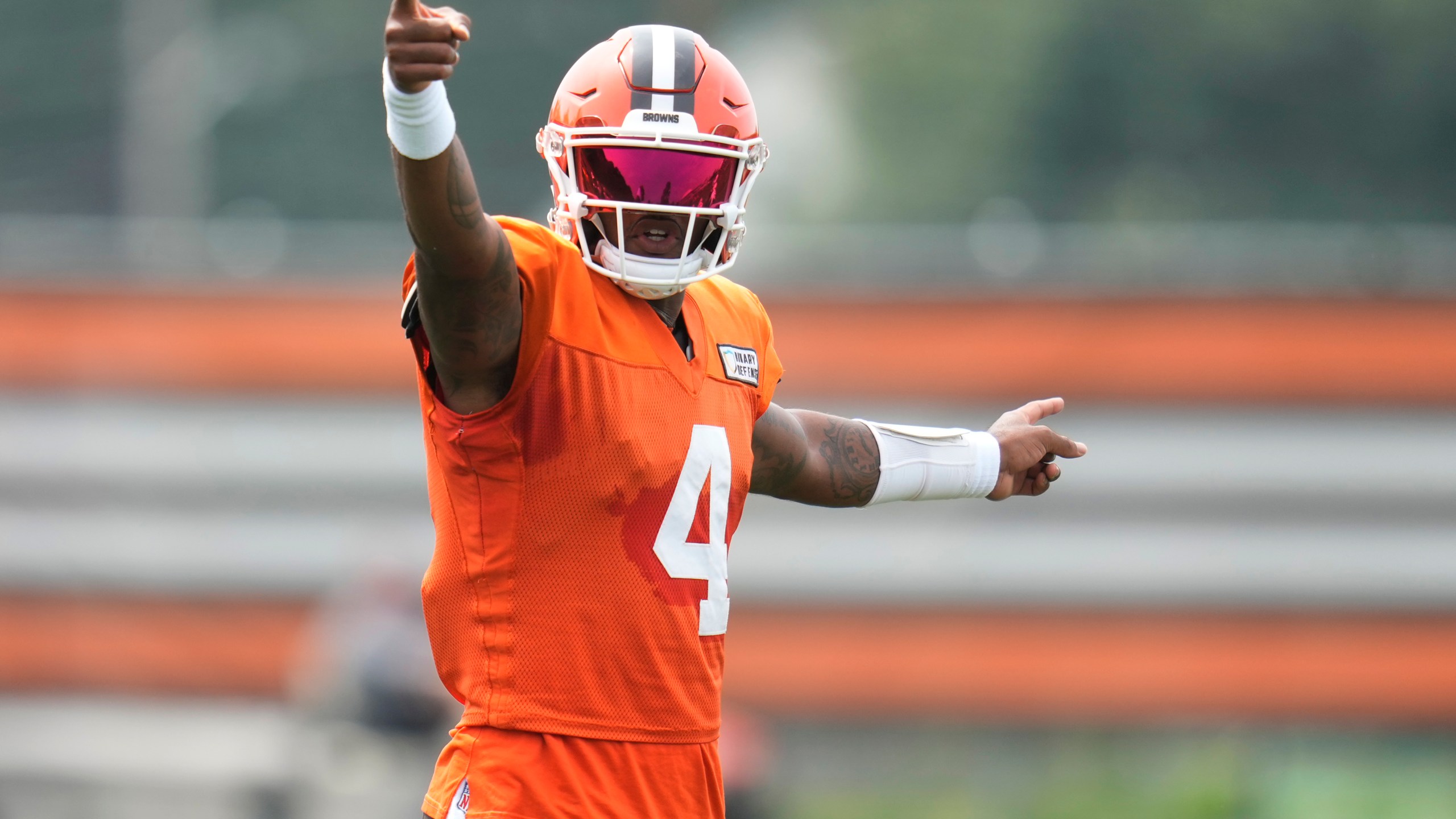 Cleveland Browns quarterback Deshaun Watson (4) gestures during a joint NFL football practice with the Minnesota Vikings, Thursday, Aug. 15, 2024, in Berea, Ohio. (AP Photo/Sue Ogrocki)