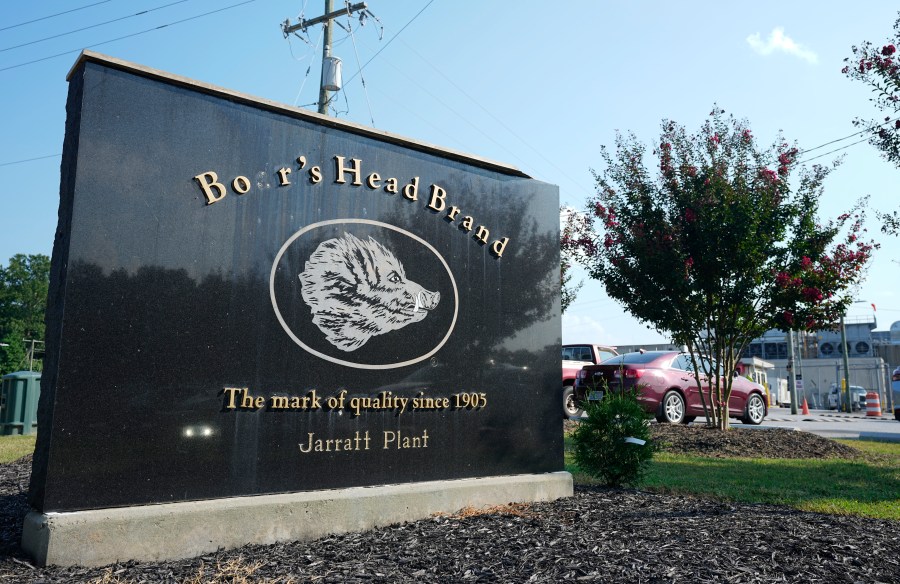 This sign marks the entrance of the Boar's Head processing plant that was tied to a deadly food poisoning outbreak Thursday Aug. 29, 2024, in Jarratt, Va. (AP Photo/Steve Helber)