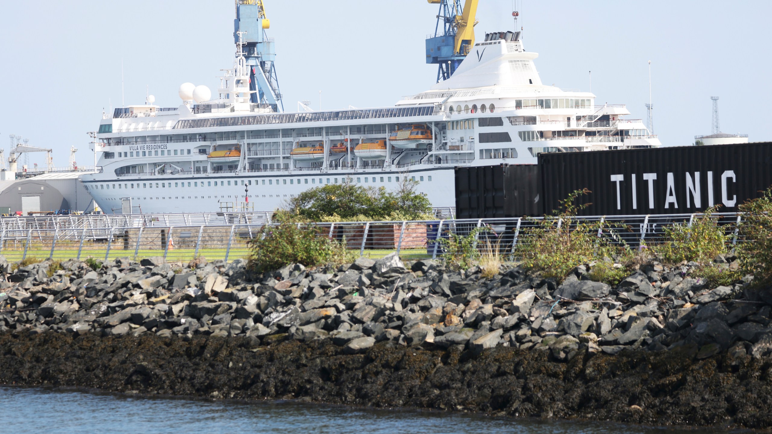 The Odyssey, a US cruise liner operated by Villa Vie Residences docked at Harland & Wolf ship repair facility in Belfast Harbour, Northern Ireland, Friday, Aug. 30, 2024. (AP Photo/Peter Morrison)