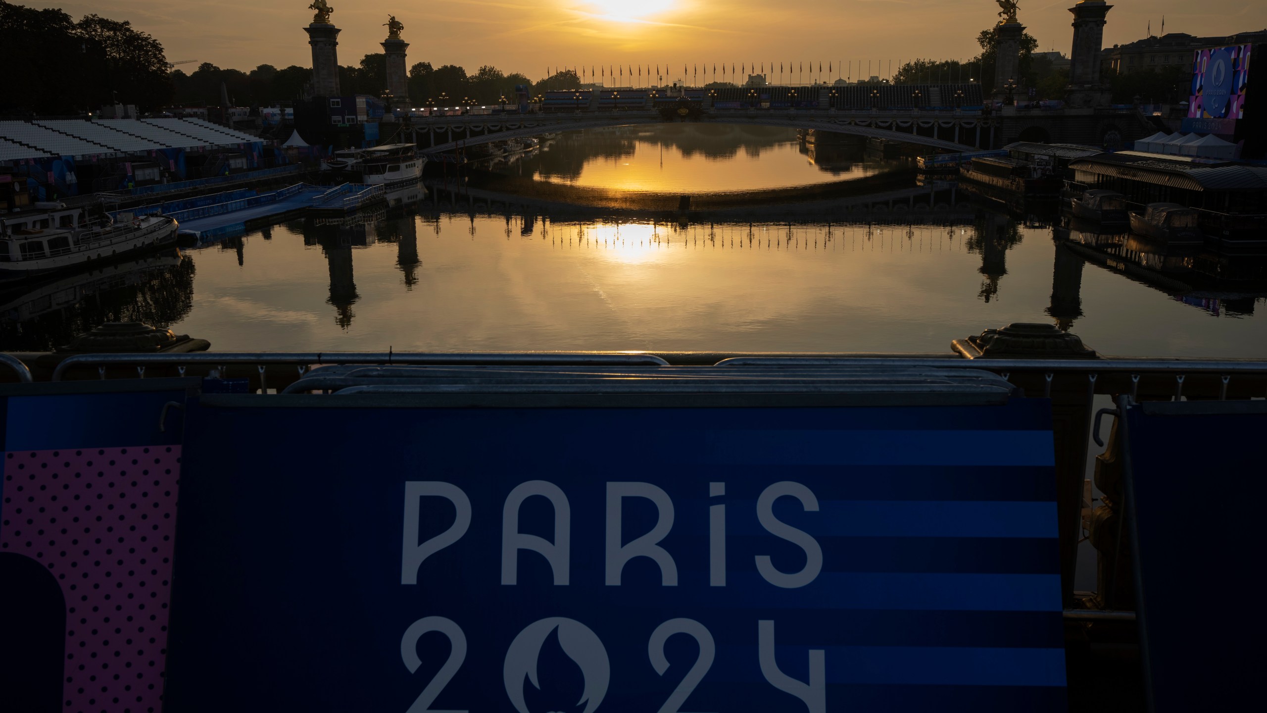 View of the Seine river where the triathlon competition has been cancelled, during the 2024 Paralympics, Sunday, Sept. 1, 2024, in Paris, France. (AP Photo/Emilio Morenatti)