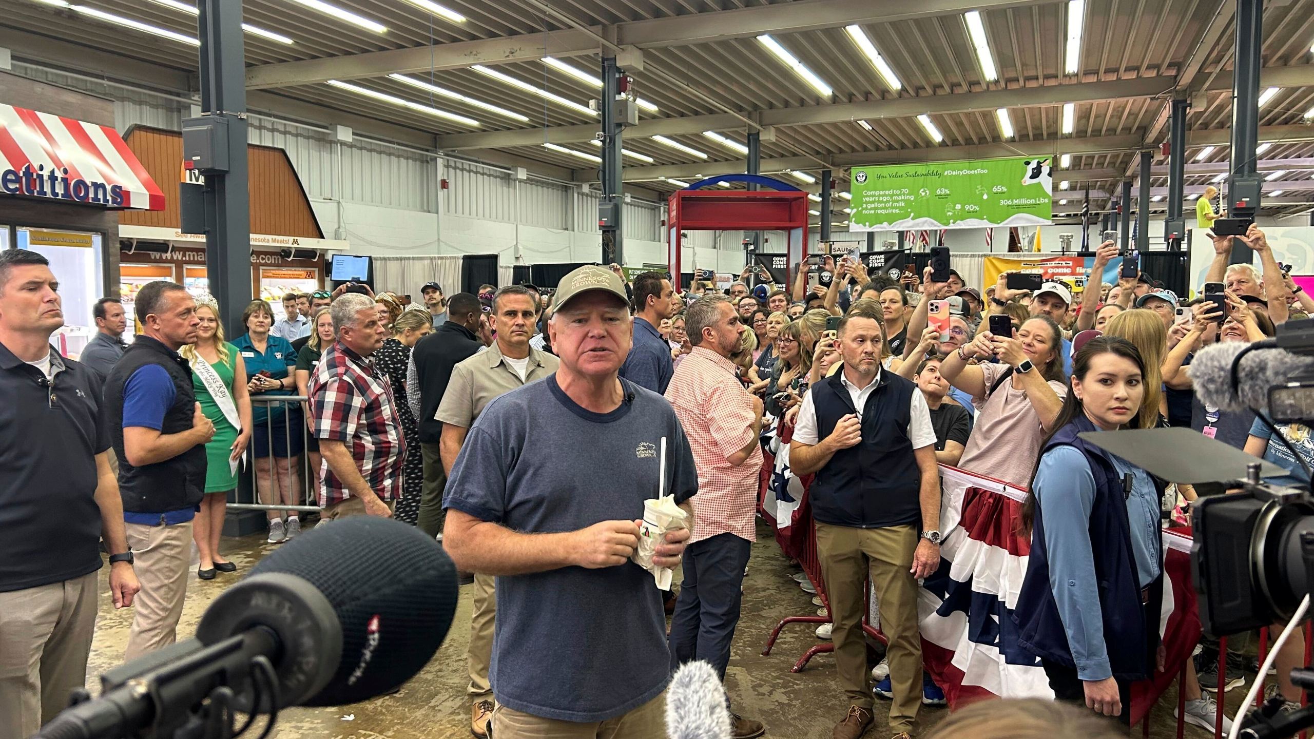 Democratic vice presidential candidate Minnesota Gov. Tim Walz speaks to a crowd gathered at the Dairy building during his visit at the Minnesota State Fair in Falcon Heights, Minn., Sunday, Sept. 1, 2024. (Clay Masters/Minnesota Public Radio via AP)