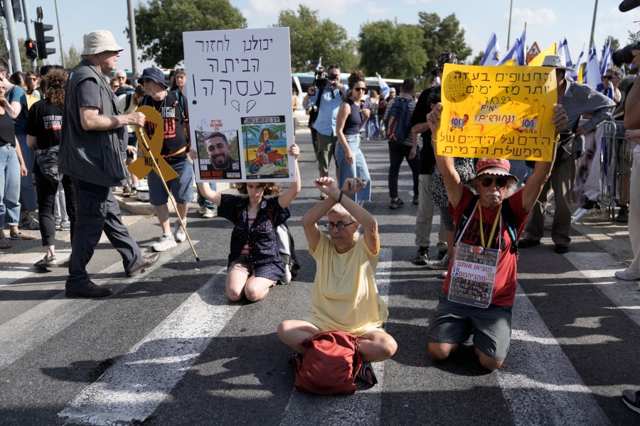 People take part in a protest to call for the immediate release of hostages held in the Gaza Strip by the Hamas militant group in Jerusalem, Sunday, Sept. 1, 2024. (AP Photo/Mahmoud Illean)