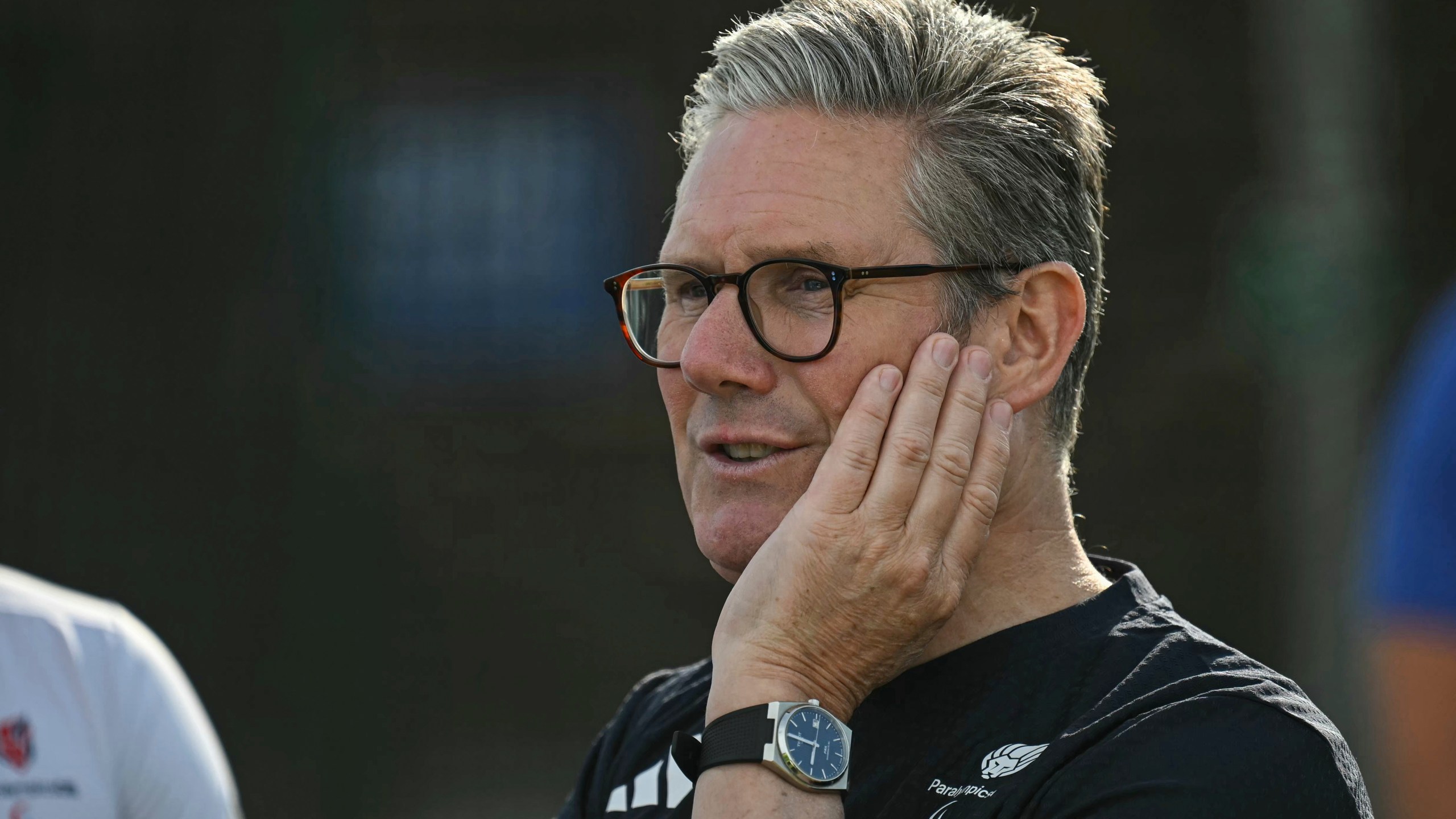 Britain's Prime Minister Keir Starmer reacts as he visits a training centre in Saint-Germain-en-Laye, northwest of Paris, Thursday, Aug. 29, 2024, amid the Paris 2024 Paralympic Games. (Justin Tallis/Pool Photo via AP)