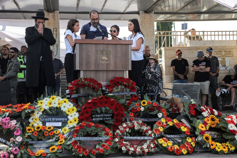 Jonathan Polin and Rachel Goldberg, parents, and sisters Orly and Leebie of killed US-Israeli hostage Hersh Goldberg-Polin whose body was recovered with five other hostages in Gaza, speak during the funeral in Jerusalem, Monday, Sept. 2, 2024. (Gil Cohen-Magen/Pool via AP)