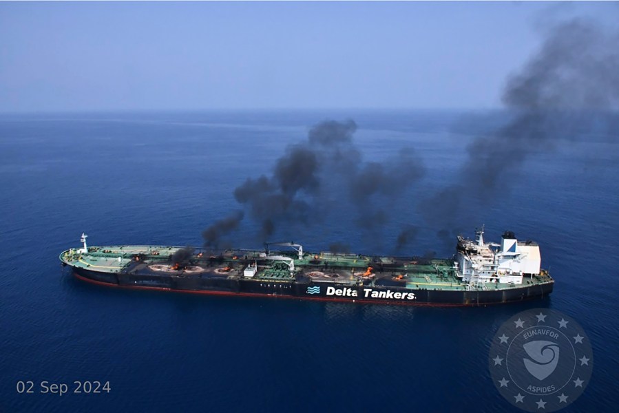 This photo released by the European Union's Operation Aspides naval force shows the Greek-flagged oil tanker Sounion burning in the Red Sea following a series of attacks by Yemen's Houthi rebels on Monday, Sept. 2, 2024. (European Union's Operation Aspides via AP)