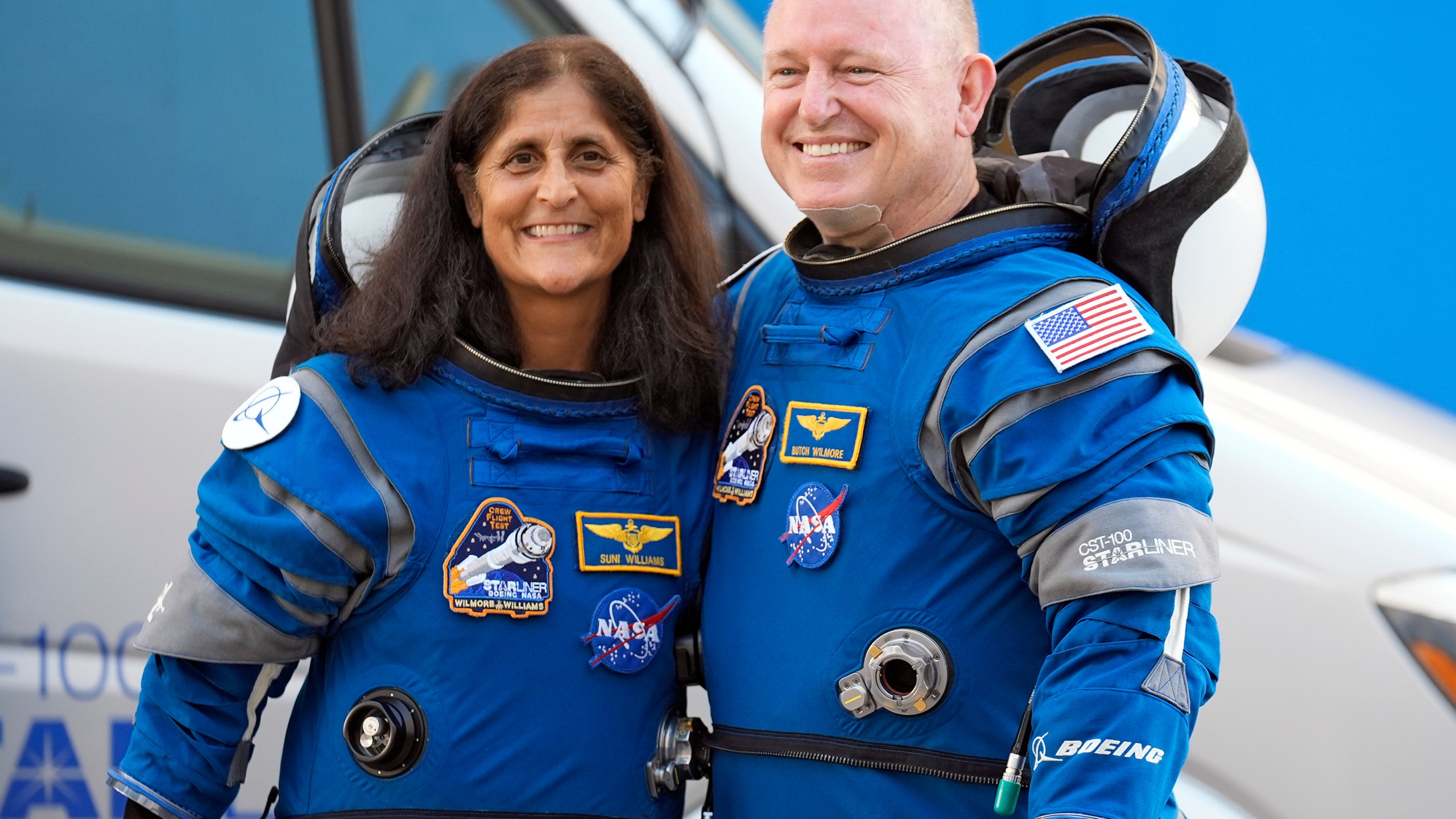 FILE - NASA astronauts Suni Williams, left, and Butch Wilmore stand together for a photo enroute to the launch pad at Space Launch Complex 41 Wednesday, June 5, 2024, in Cape Canaveral, Fla., for their liftoff on the Boeing Starliner capsule to the international space station. (AP Photo/Chris O'Meara, File)