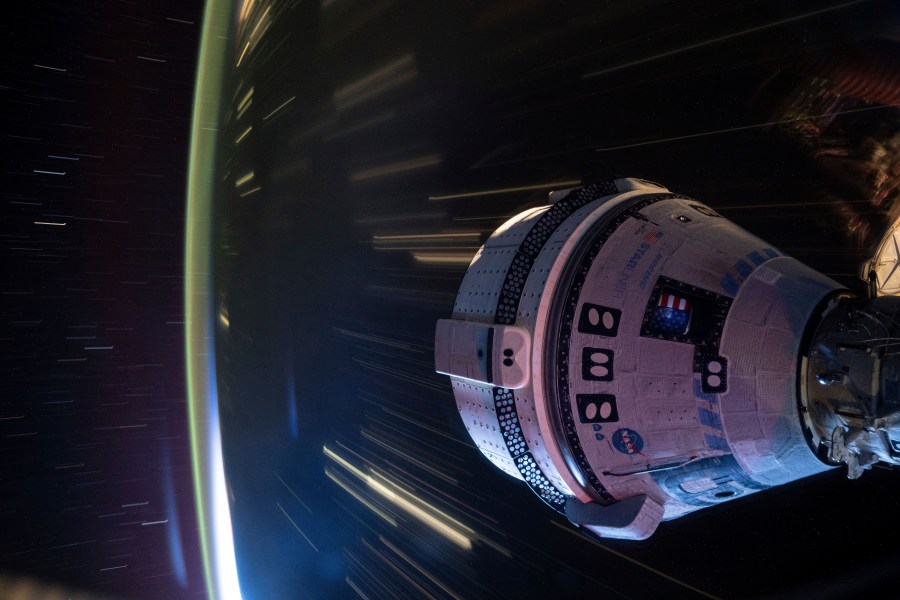 In this long-exposure photo provided by NASA, Boeing's Starliner spacecraft is docked to the Harmony module of the International Space Station on July 3, 2024. (NASA via AP)