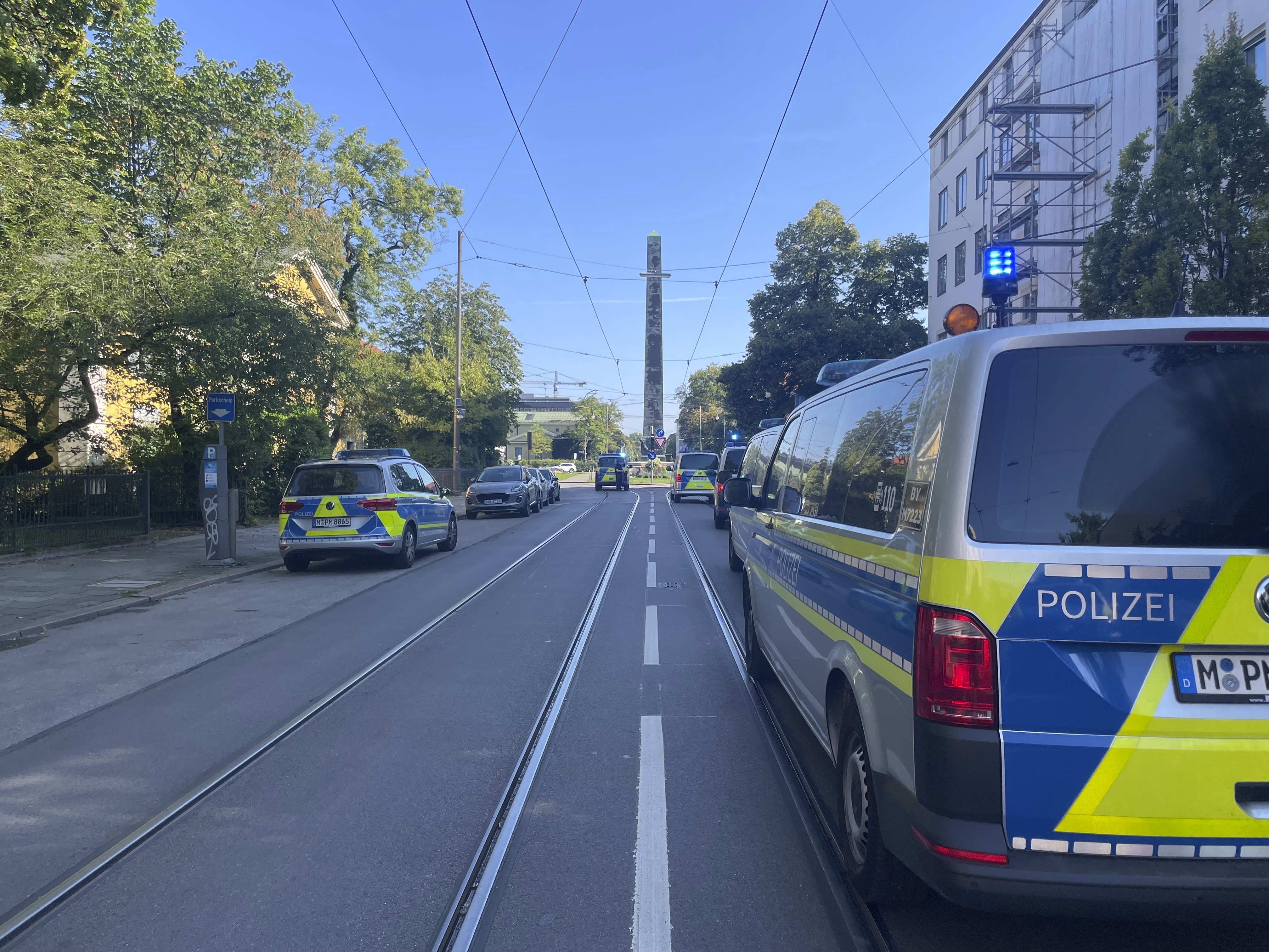 Police vehicles parked in Munich near the Nazi Documentation Center and the Israeli Consulate General in Munich, Germany, Thursday, Sept. 5, 2024. (Simon Sachseder/dpa via AP)