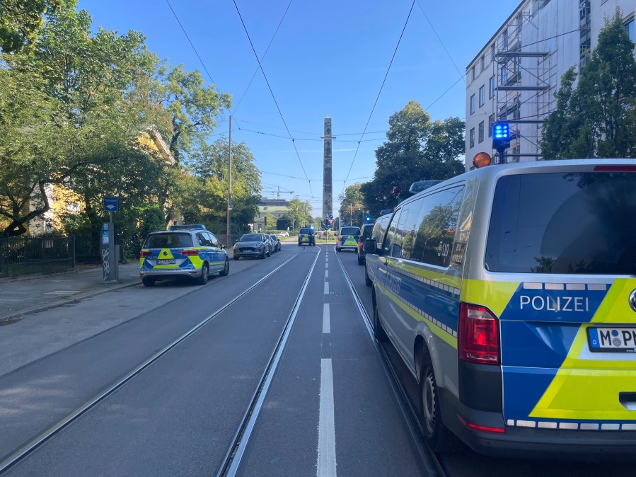 Police vehicles parked in Munich near the Nazi Documentation Center and the Israeli Consulate General in Munich, Germany, Thursday, Sept. 5, 2024. (Simon Sachseder/dpa via AP)