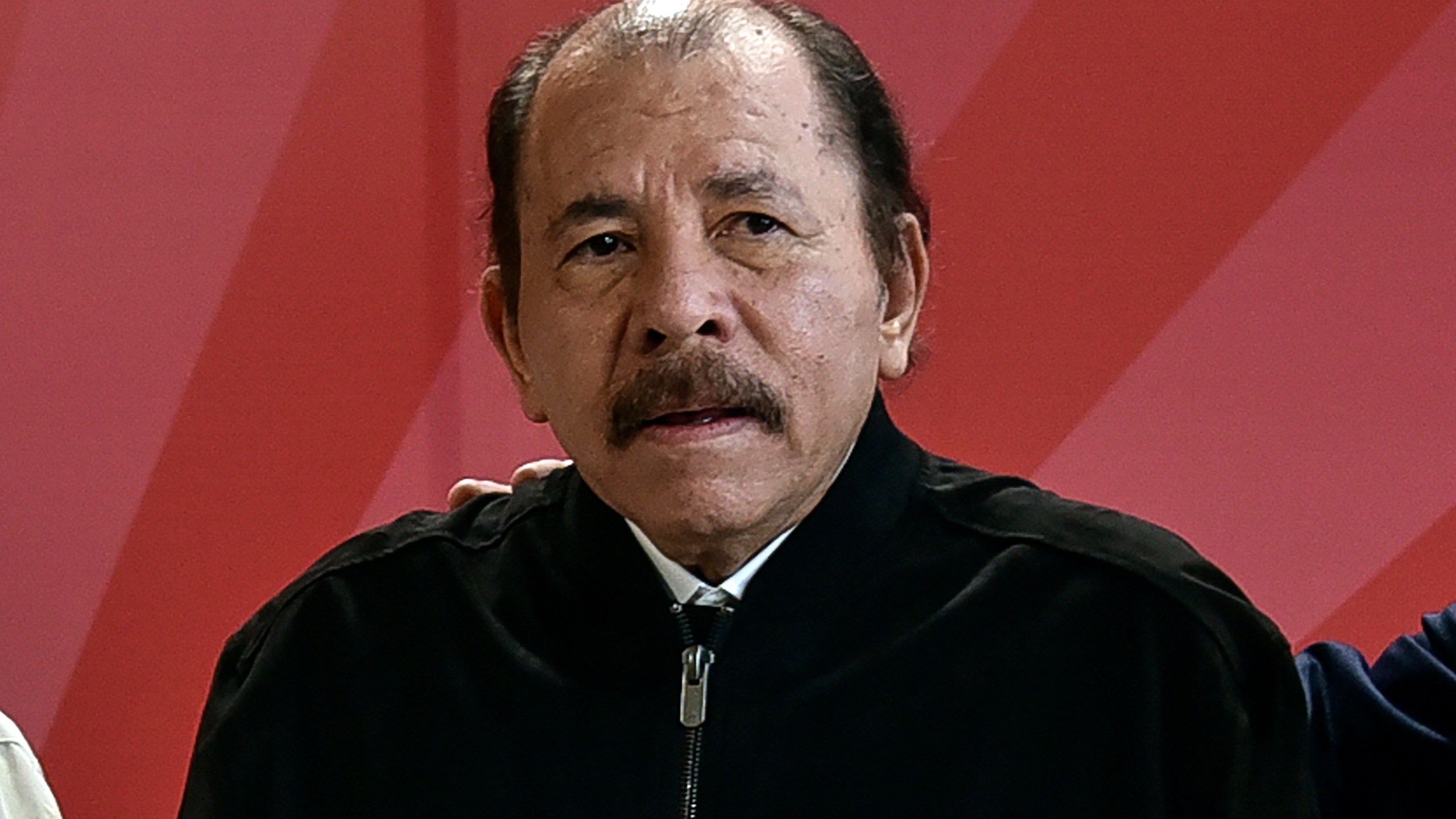 FILE - Nicaragua's President Daniel Ortega poses for a photo during the ALBA Summit at the Palace of the Revolution in Havana, Cuba, Dec. 14, 2021. (Adalberto Roque, Pool Photo via AP, File)