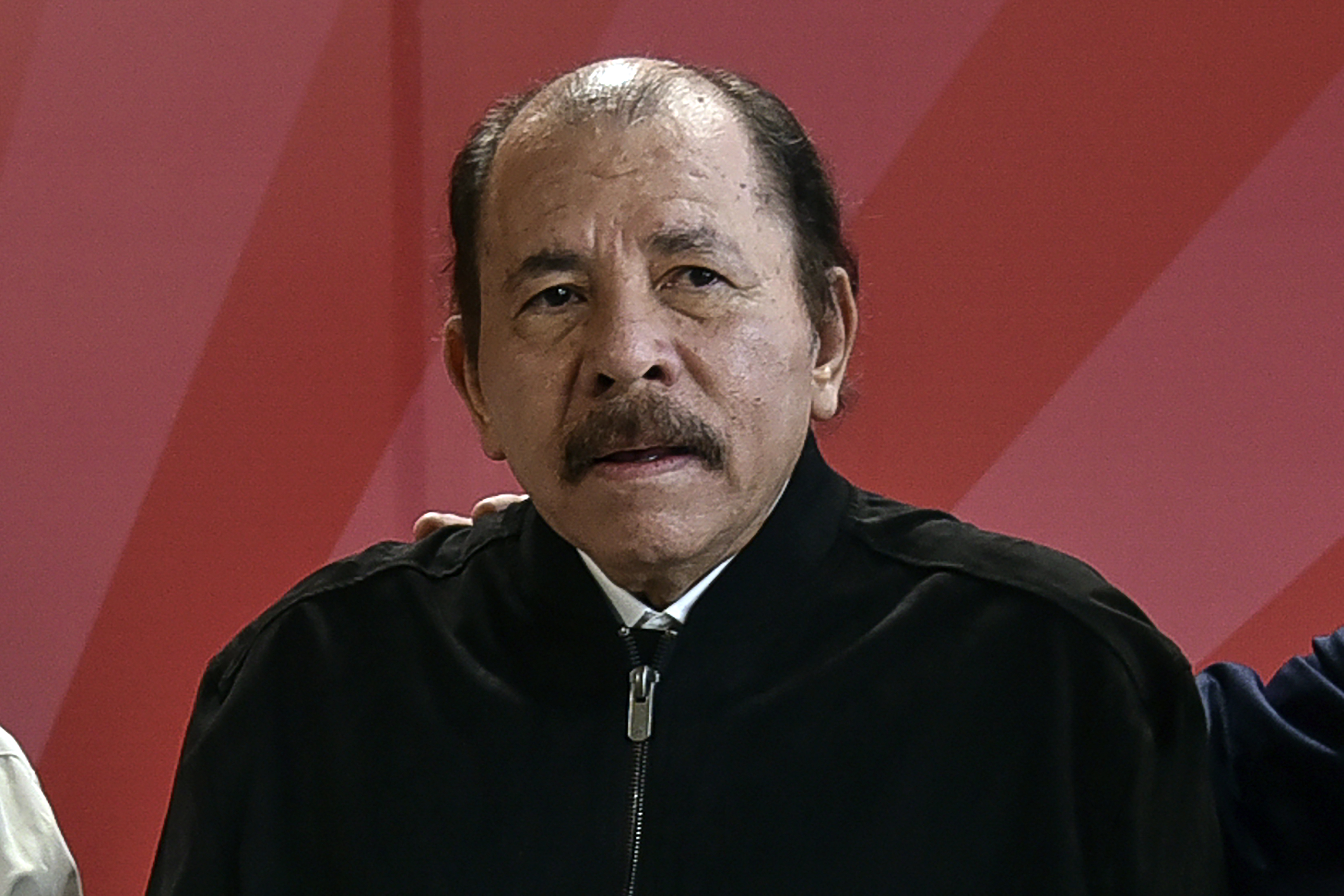 FILE - Nicaragua's President Daniel Ortega poses for a photo during the ALBA Summit at the Palace of the Revolution in Havana, Cuba, Dec. 14, 2021. (Adalberto Roque, Pool Photo via AP, File)