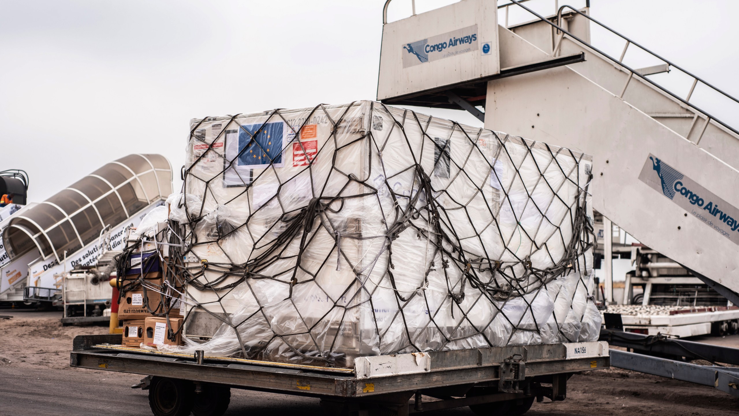 Mpox vaccine MVA-BN vaccine, manufactured by the Danish company Bavarian Nordic, are offloaded from a plane in Kinshasa, Congo, Thursday, Sept. 5, 2024. (AP Photo/Samy Ntumba Shambuyi)