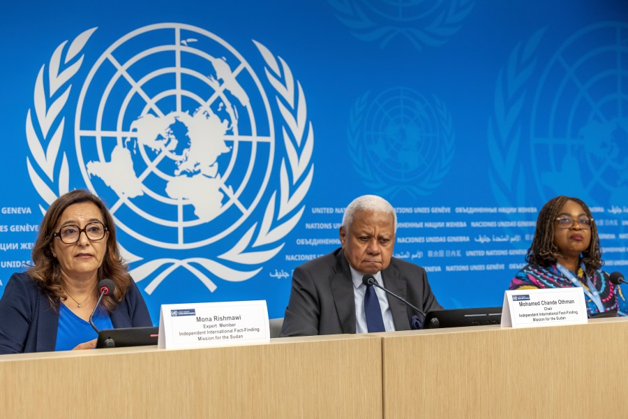 From left, United Nations Fact-Finding Mission's expert member Mona Rishmawi, left, its chair Mohamed Chande Othman and expert member Joy Ngozi Ezeilo present its first investigative report to the media during a press conference at the European headquarters of the United Nations in Geneva, Switzerland, Friday, Sept. 6, 2024. (Salvatore Di Nolfi/Keystone via AP)