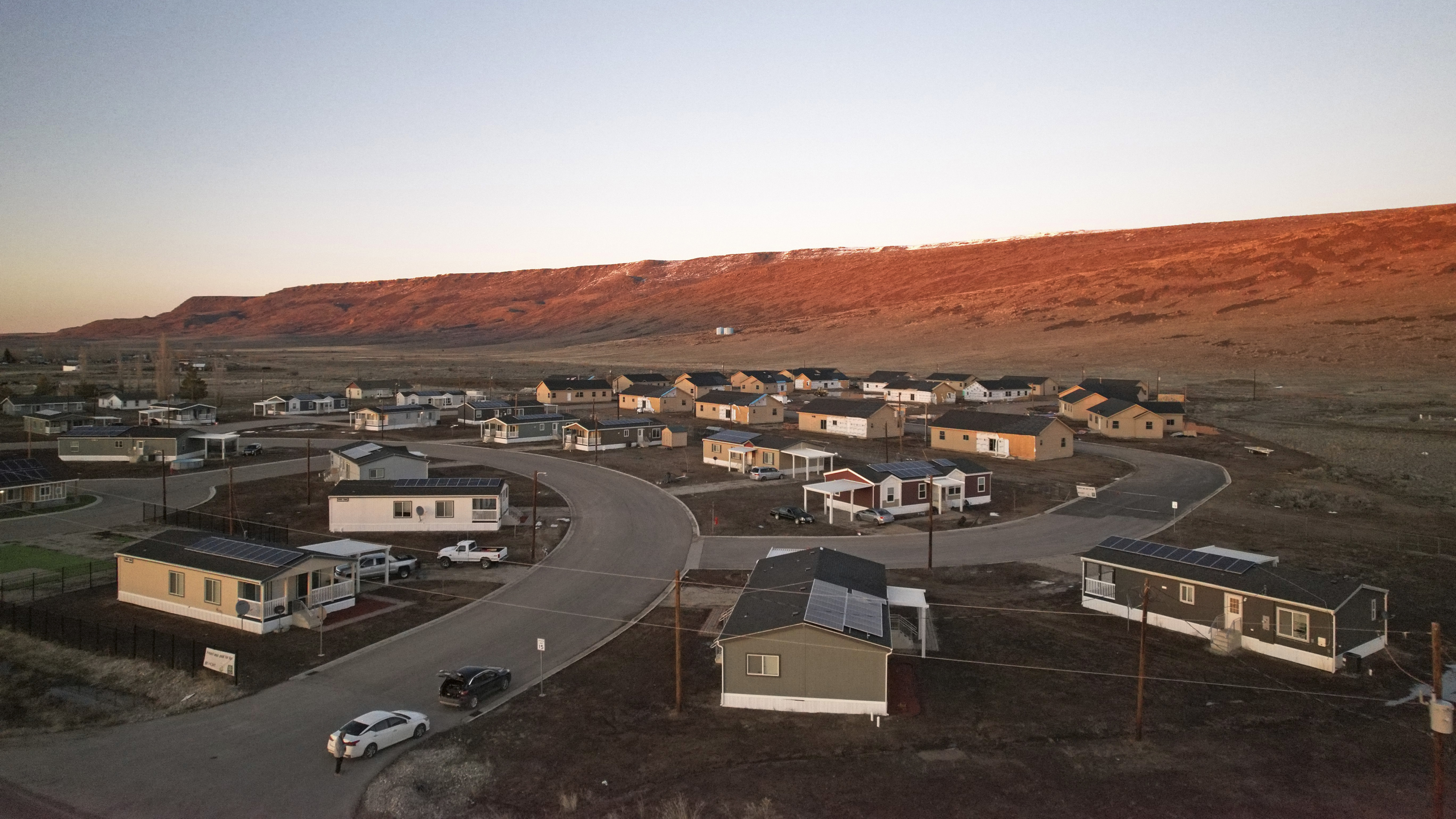 Homes on the Duck Valley Indian Reservation that straddles the Nevada-Idaho border are shown on March 14, 2024, in Owyhee, Nev. (AP Photo/Rick Bowmer)