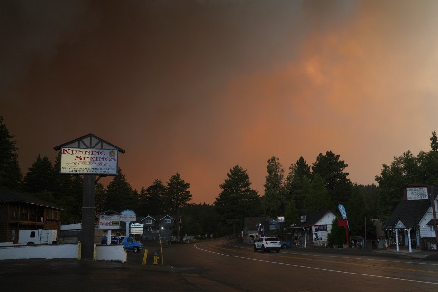 FILE - Smoke from the Line Fire fills the air Saturday, Sept. 7, 2024, in Running Springs, Calif. (AP Photo/Eric Thayer, File)