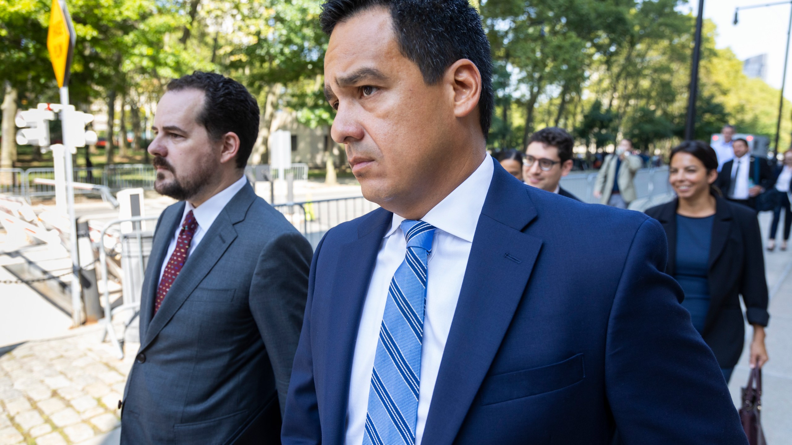 Assistant U.S. Attorney Francisco Navarro, right, leaves Brooklyn Federal court after the arraignment of longtime drug cartel leader Ismael “El Mayo” Zambada, Friday, Sept.13, 2024, in New York. (AP Photo/Corey Sipkin)