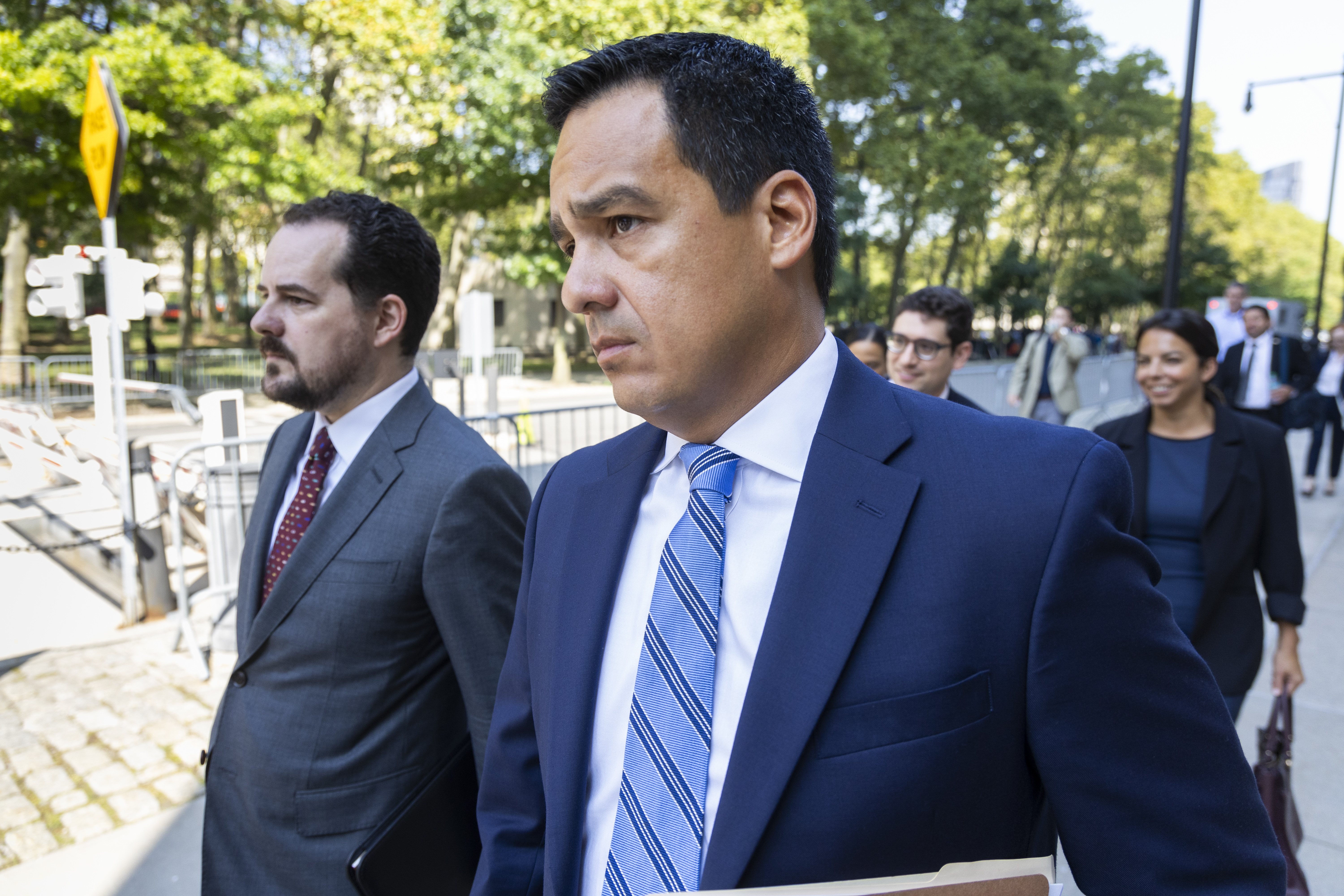 Assistant U.S. Attorney Francisco Navarro, right, leaves Brooklyn Federal court after the arraignment of longtime drug cartel leader Ismael “El Mayo” Zambada, Friday, Sept.13, 2024, in New York. (AP Photo/Corey Sipkin)