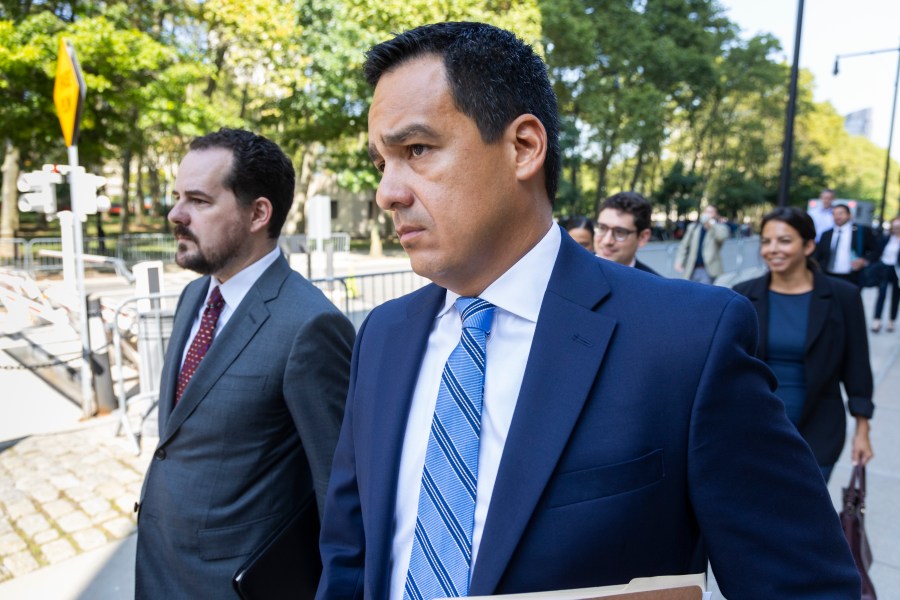 Assistant U.S. Attorney Francisco Navarro, right, leaves Brooklyn Federal court after the arraignment of longtime drug cartel leader Ismael “El Mayo” Zambada, Friday, Sept.13, 2024, in New York. (AP Photo/Corey Sipkin)