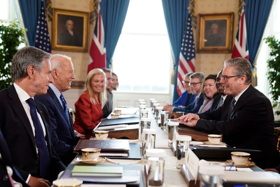 Britain's Prime Minister Keir Starmer, right, and Foreign Secretary David Lammy, second right, during a meeting with US President Joe Biden, 2nd left, in the Blue Room at the White House in Washington, Friday Sept. 13, 2024. (Stefan Rousseau/Pool via AP)