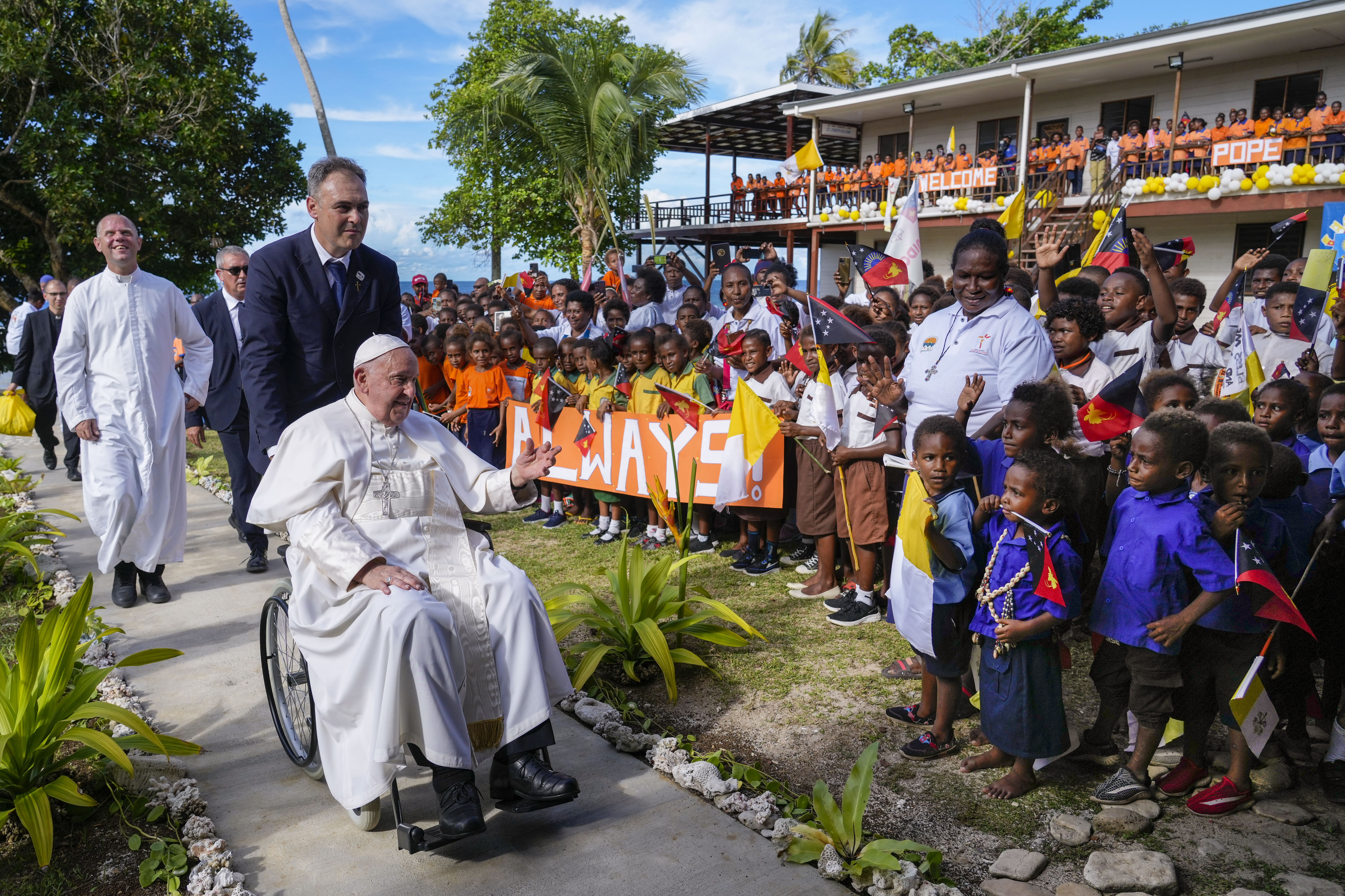 Pope Francis arrives at the Holy Trinity Humanistic School in Baro, near Vanimo, Papua New Guinea, Sunday, Sept. 8, 2024. (AP Photo/Gregorio Borgia)