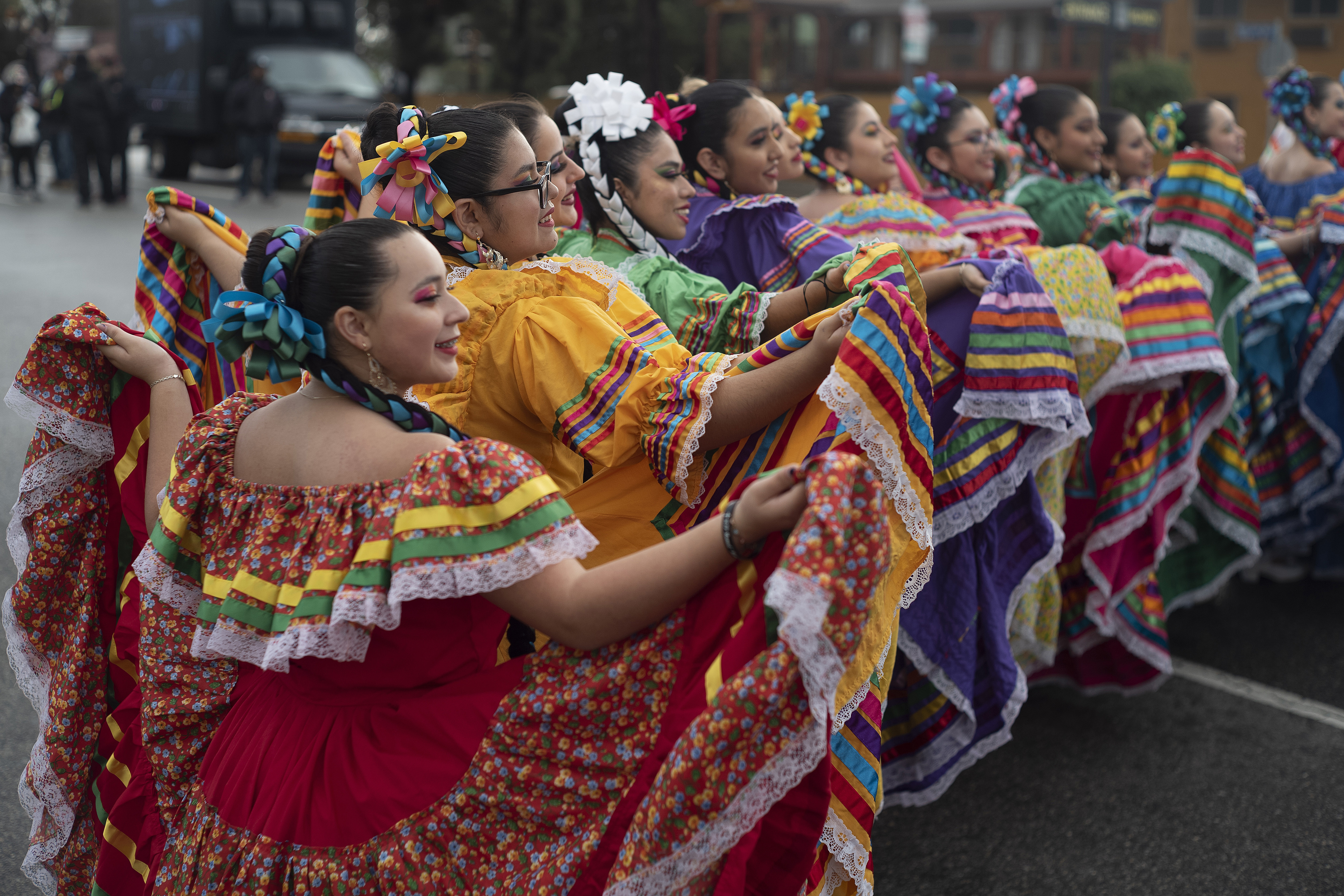 FILE - Members of the Cathedral City High School Ballet Folklorico pose for photo prior to joining in the Kingdom Day Parade in Los Angeles, Jan. 16, 2023. (AP Photo/Richard Vogel, File)