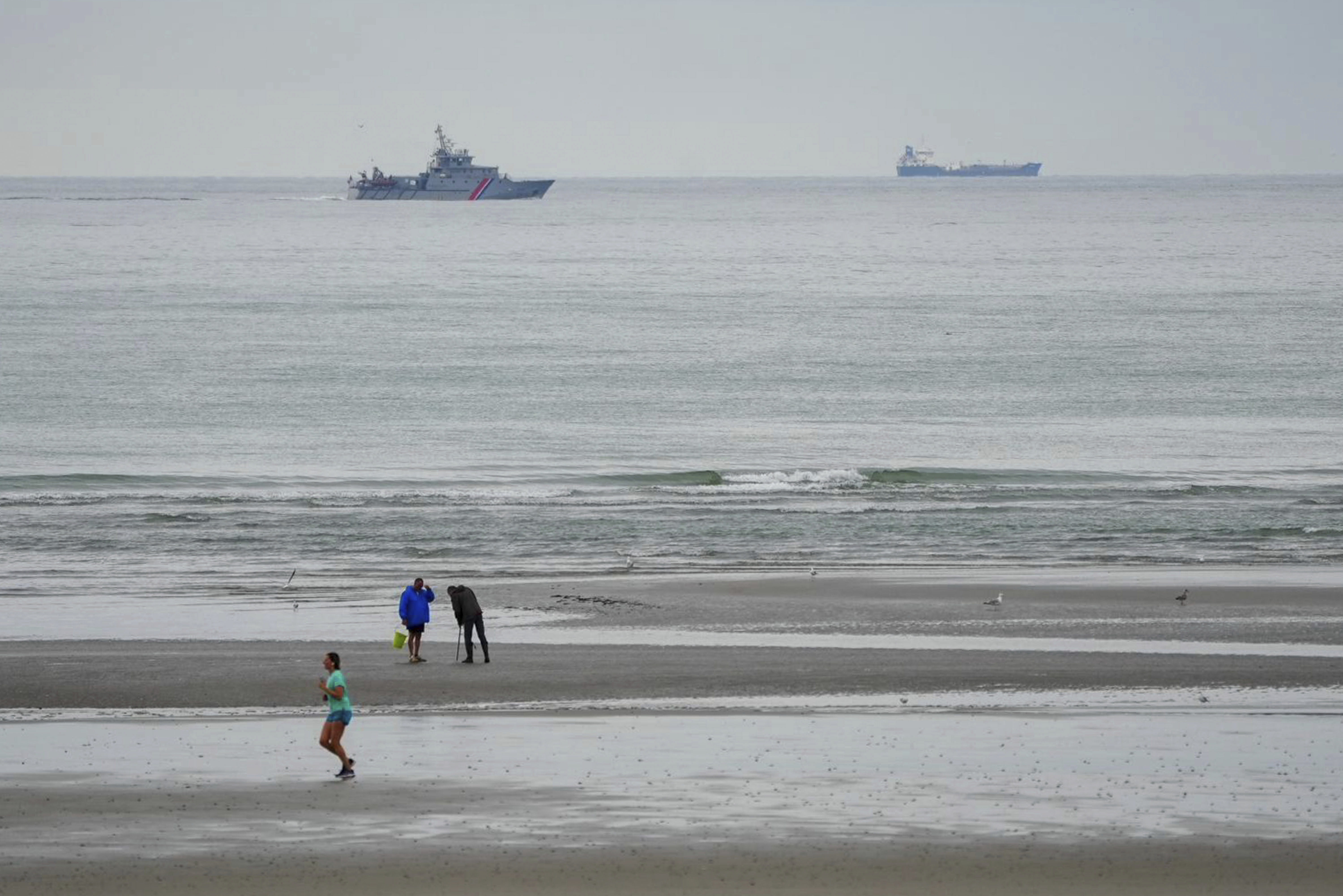 FILE - A vessel of the French Gendarmerie Nationale patrols in front of the Wimereux beach, France, Wednesday, Sept. 4, 2024. (AP Photo/Nicholas Garriga, File)