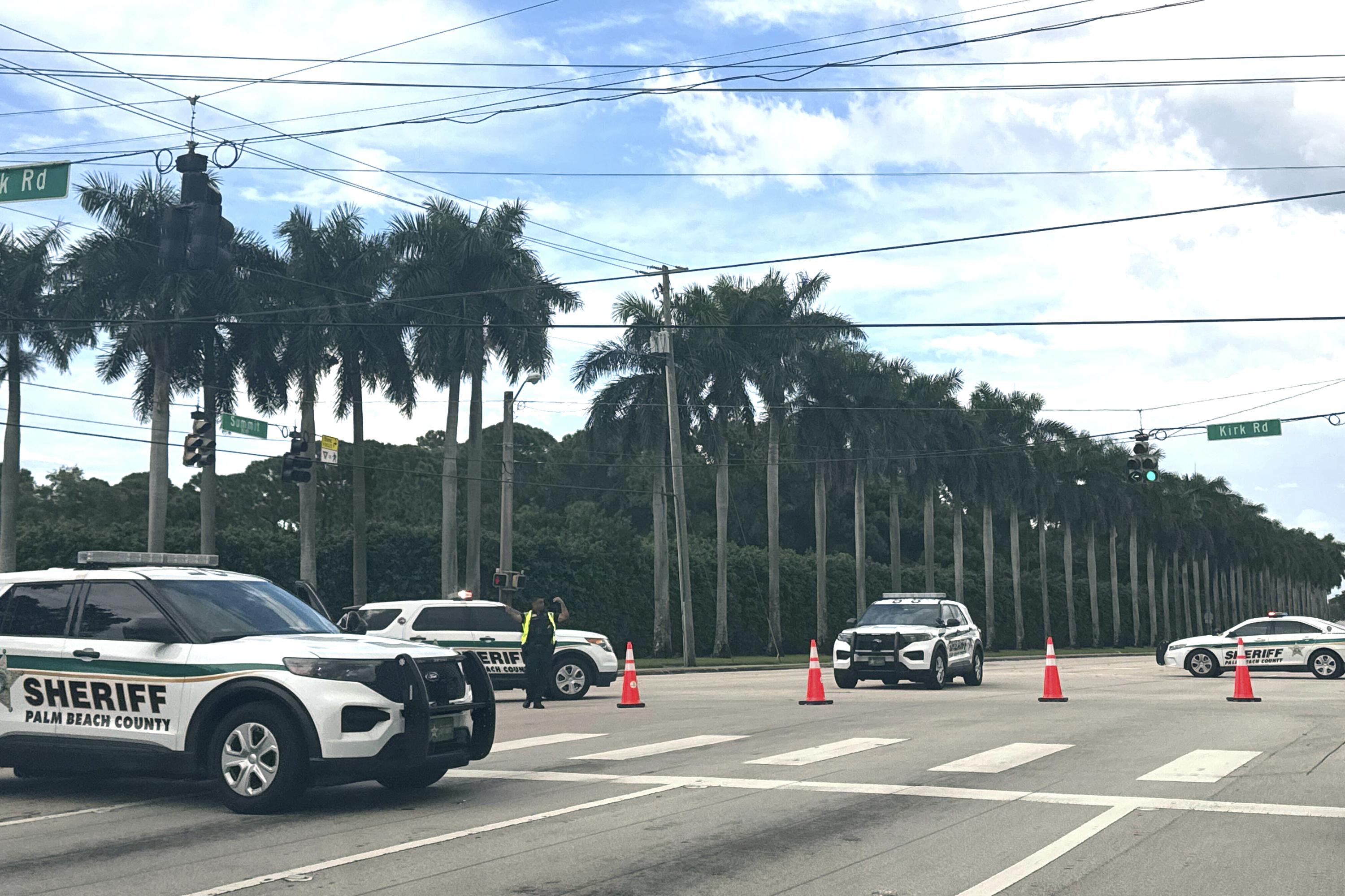 Sheriff vehicles are pictured near Trump International Golf Club, Sunday. Sept. 15, 2024, in West Palm Beach, Fla., after gunshots were reported in the vicinity of Republican presidential candidate former President Donald Trump. (AP Photo/Stephany Matat)