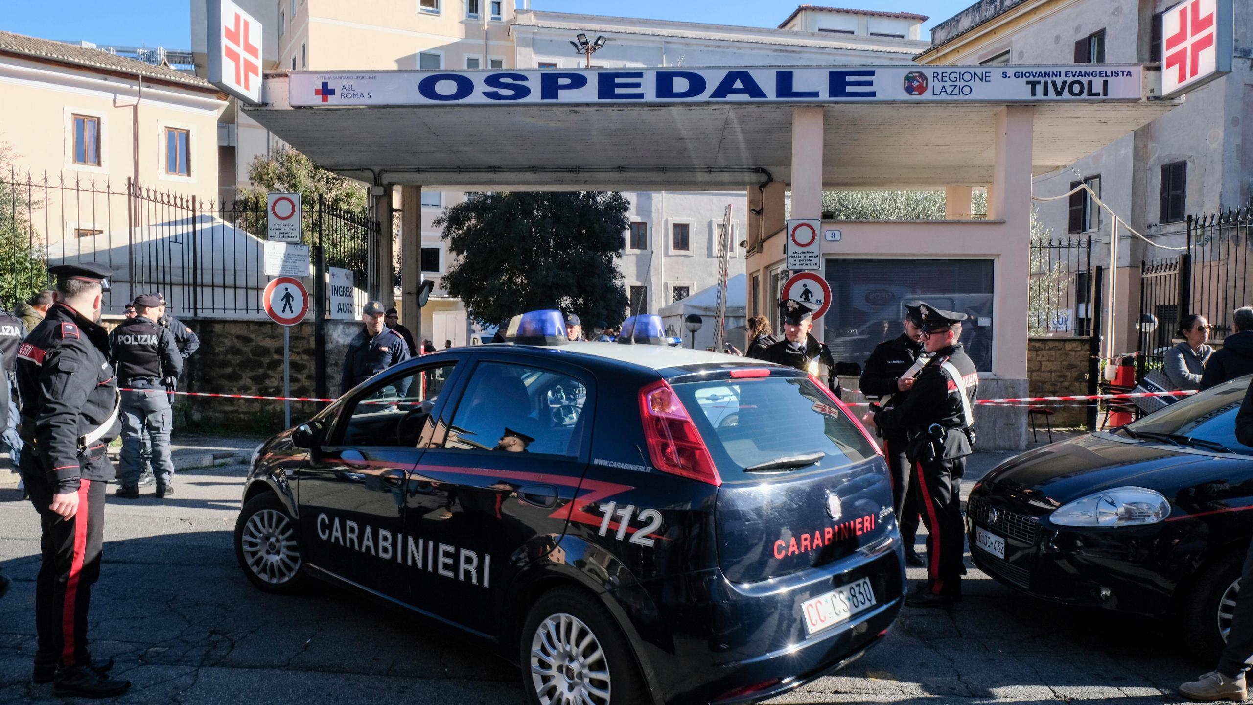 FILE - Carabinieri (Italian paramilitary police) officers outside the San Giovanni Evangelista Hospital in Tivoli, Italy, on Dec. 9, 2023. (Mauro Scrobogna/LaPresse via AP, File)