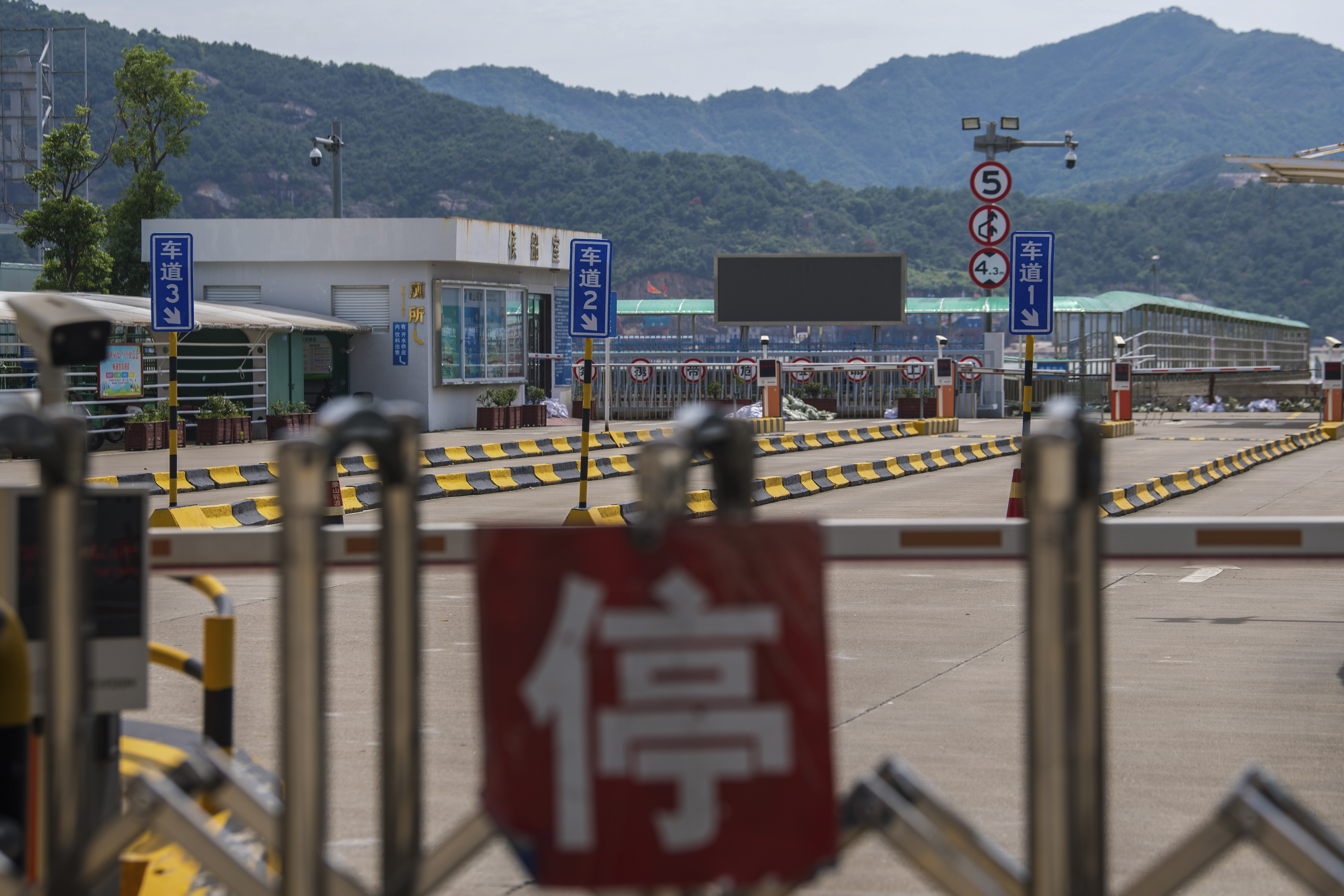 In this photo released by Xinhua News Agency, a ferry terminal is closed as they brace for impact from Typhoon Bebinca, in Xiangshan County, east China's Zhejiang Province, Sunday, Sept. 15, 2024. (Jiang Han/Xinhua via AP)